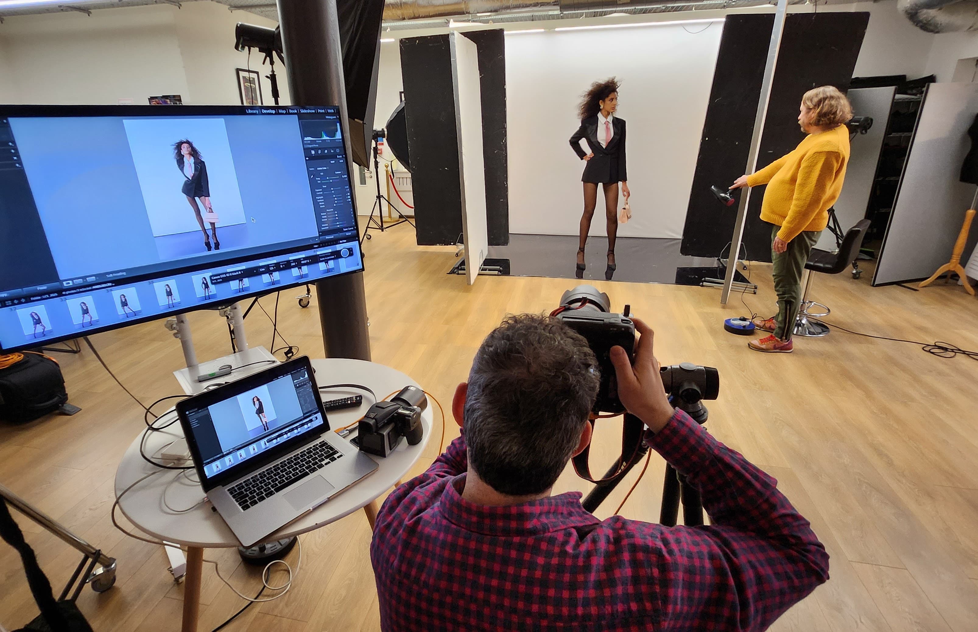 Professional film and photo shoot with lighting gear at Lumiere Underwood creative event space.