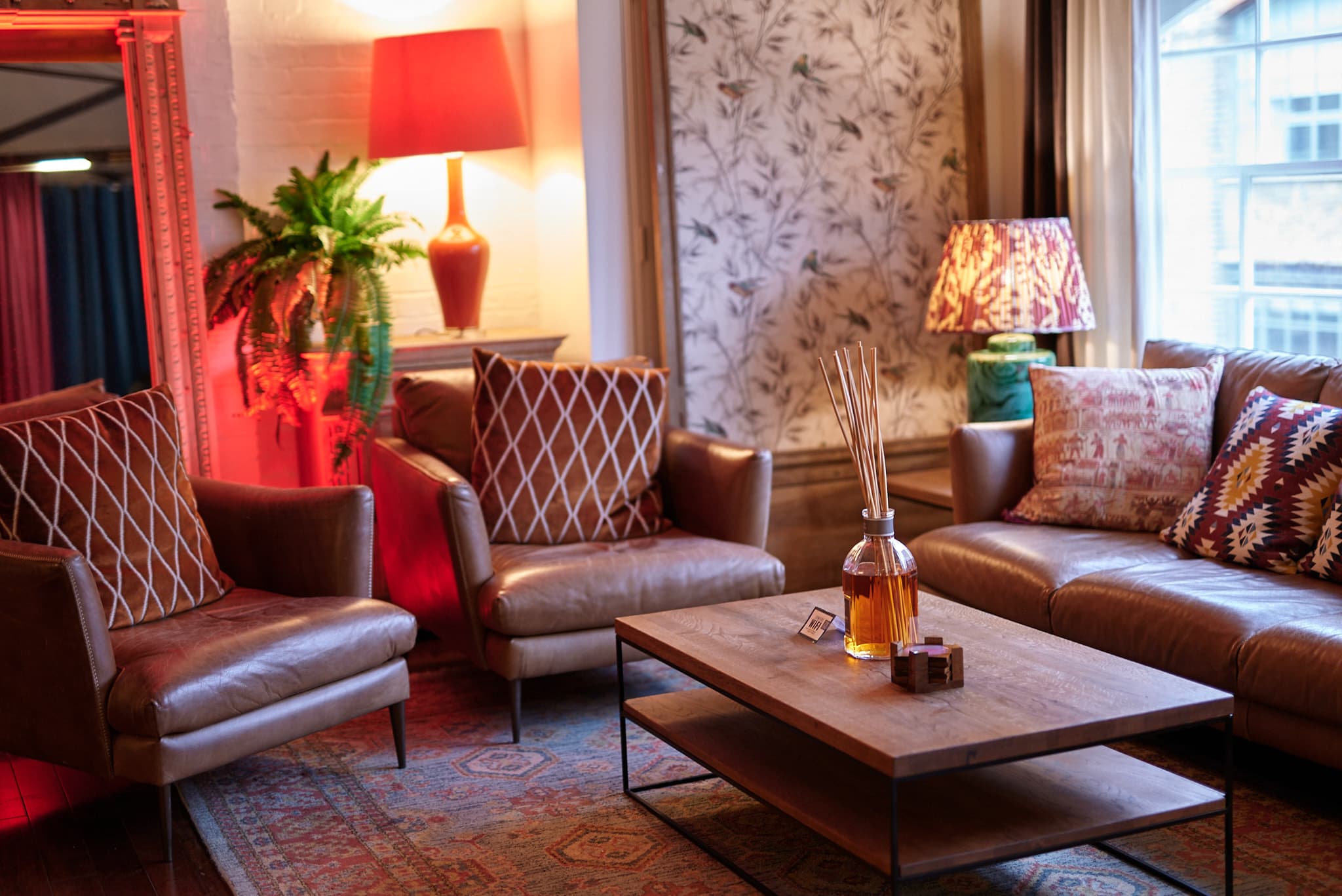 Plush leather lounge at Lumiere Underwood for executive networking and small-group corporate events.