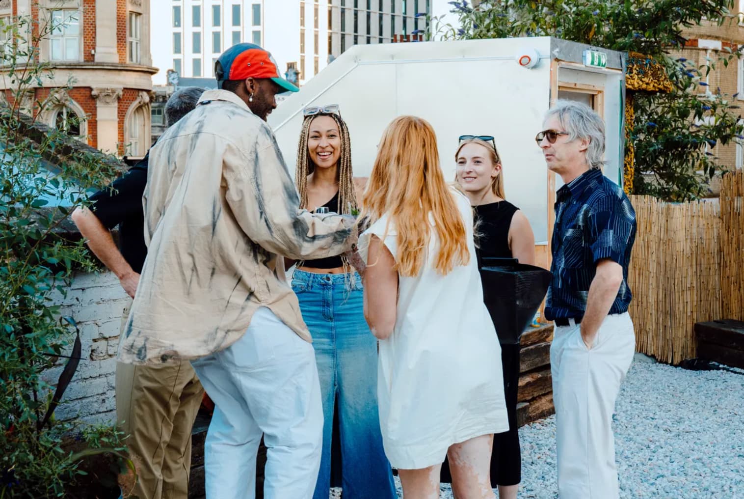 Village Underground rooftop networking reception featuring casual, inclusive event atmosphere.