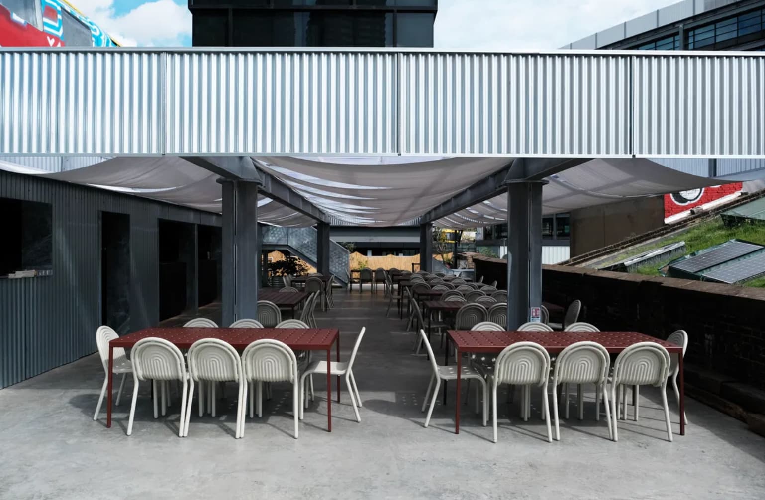Village Underground industrial rooftop venue for corporate mixers and breakout sessions.