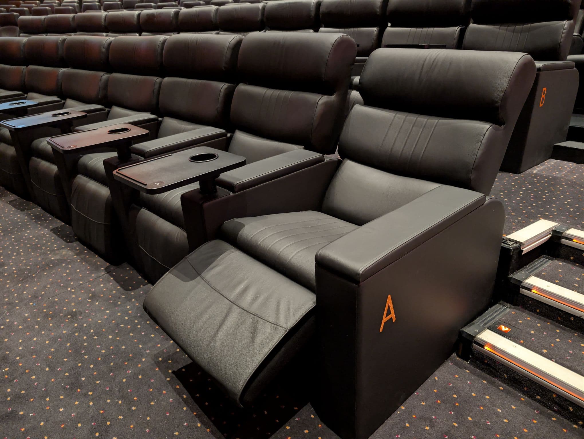 Premium tiered theater at Vue West End, ideal for corporate presentations and VIP keynote events.