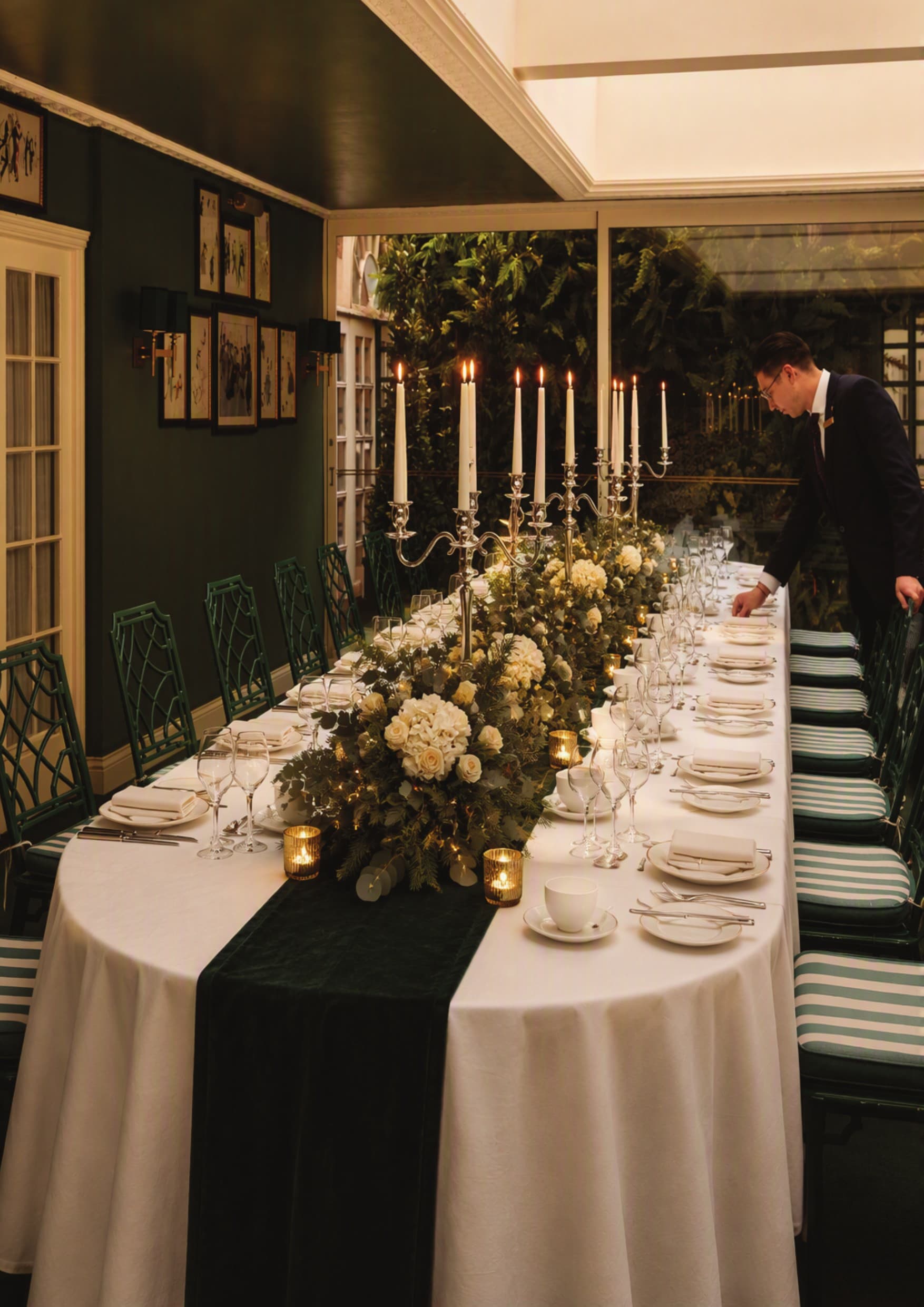Luxury Christmas party table setting with elegant candelabras at The Chesterfield Mayfair.