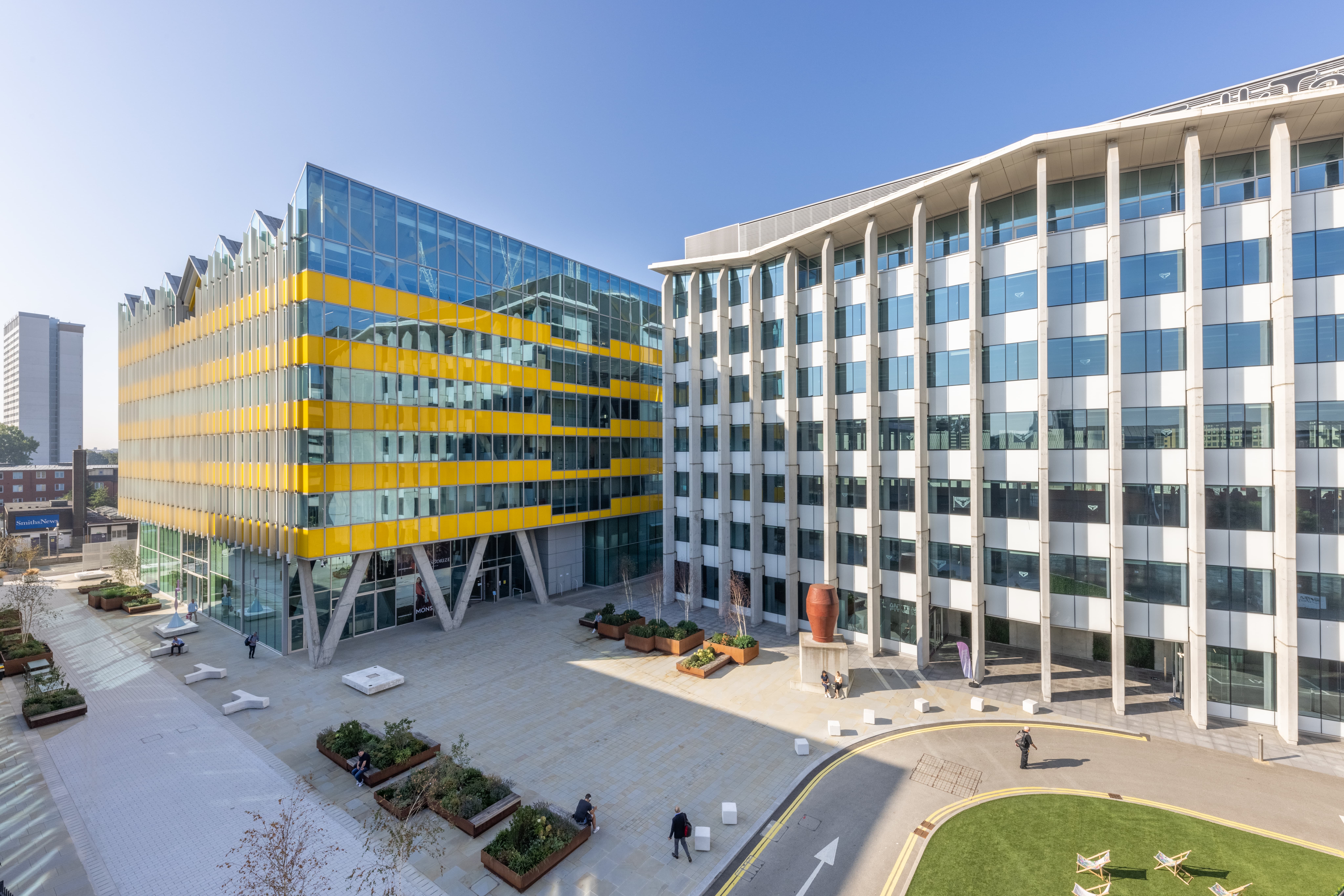 Modern corporate campus outdoor plaza for networking events and brand activations.
