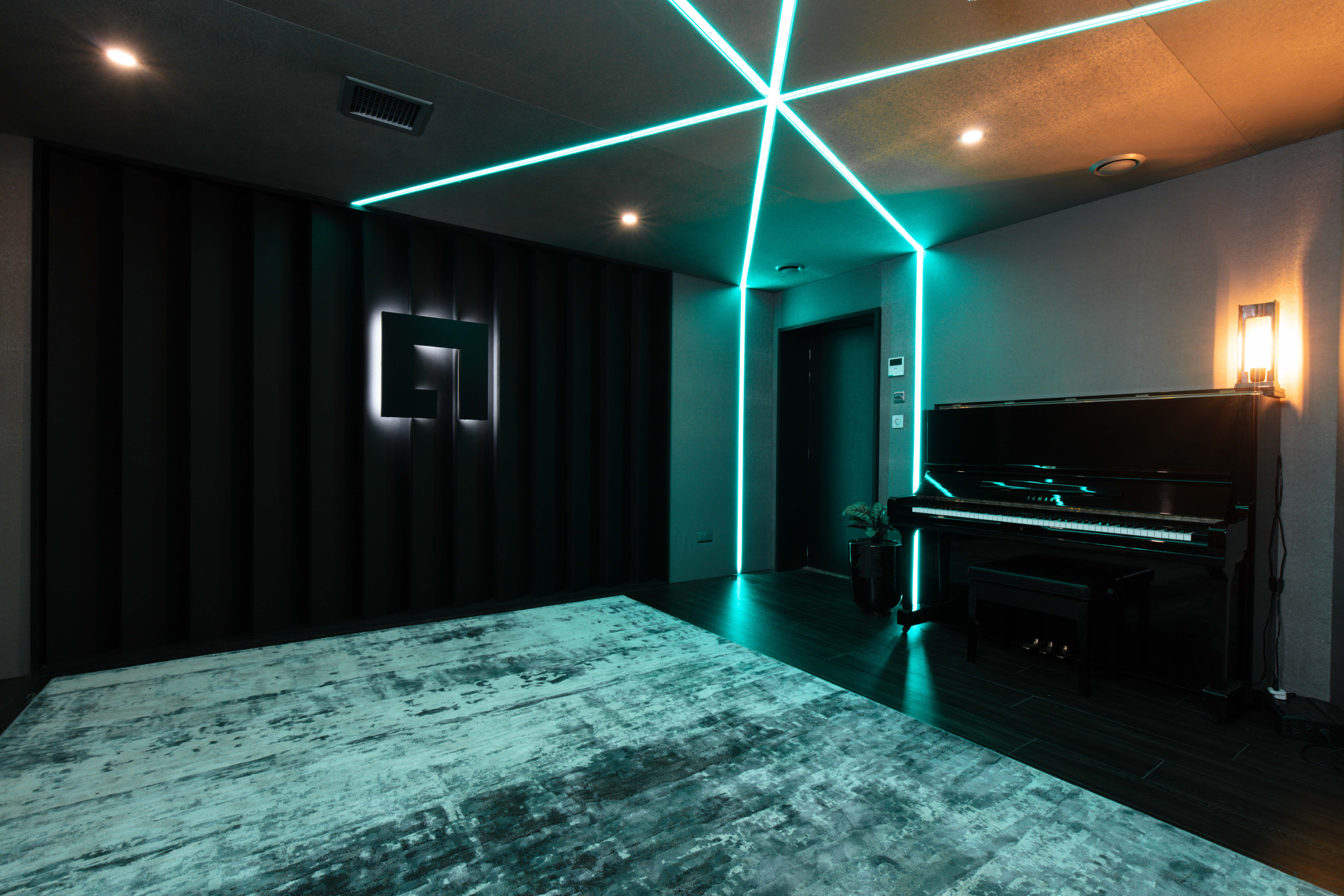 Qube Acton Studio A: Moody VIP lounge and acoustic breakout space for corporate networking events.