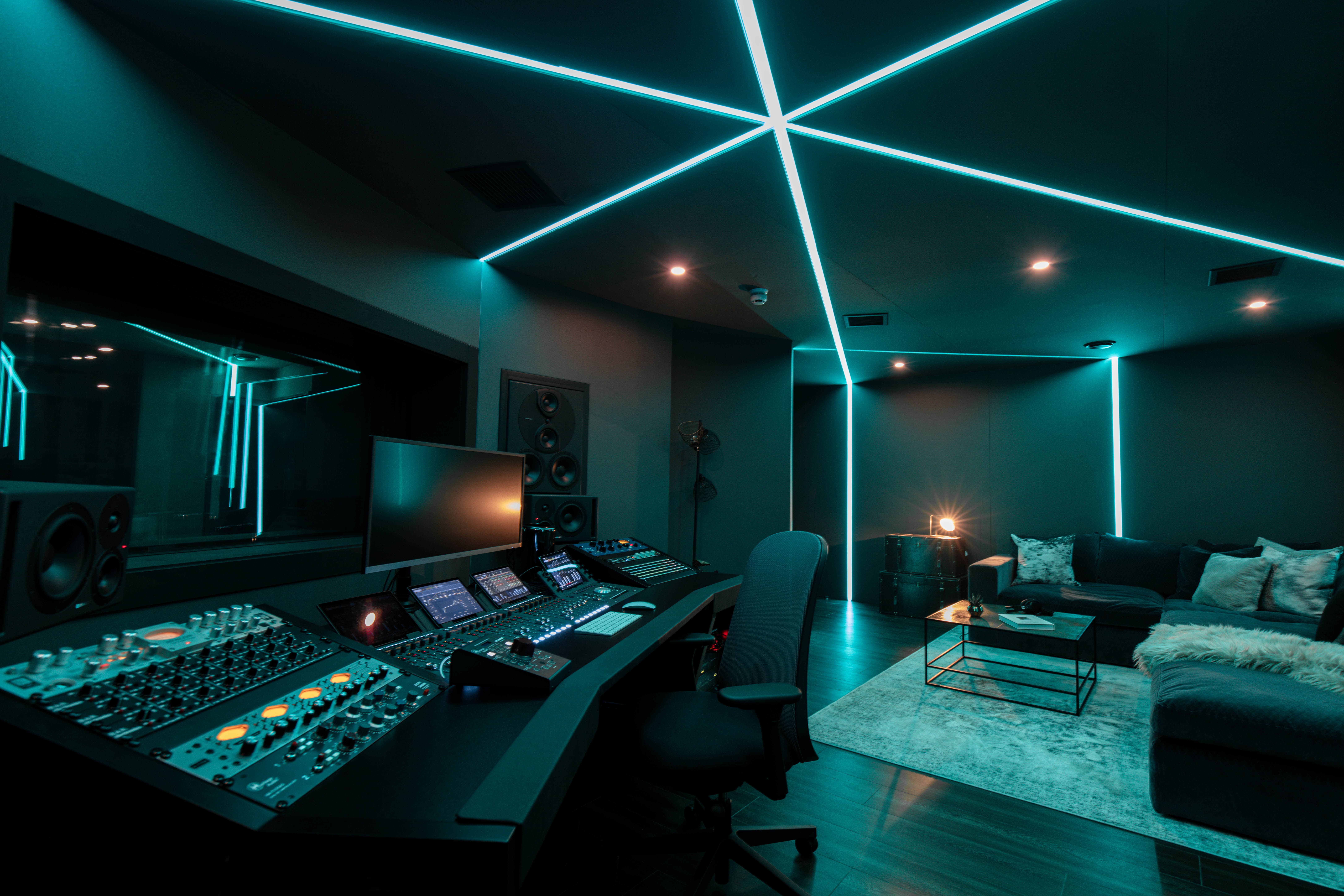 Qube Acton Studio A: Moody creative suite for VIP breakout sessions and high-tech podcast events.