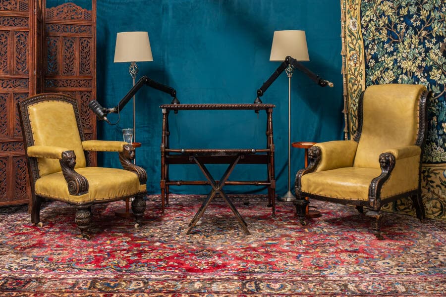 Vintage podcast suite in Qube Acton with boom arms for intimate interview and fireside chat.
