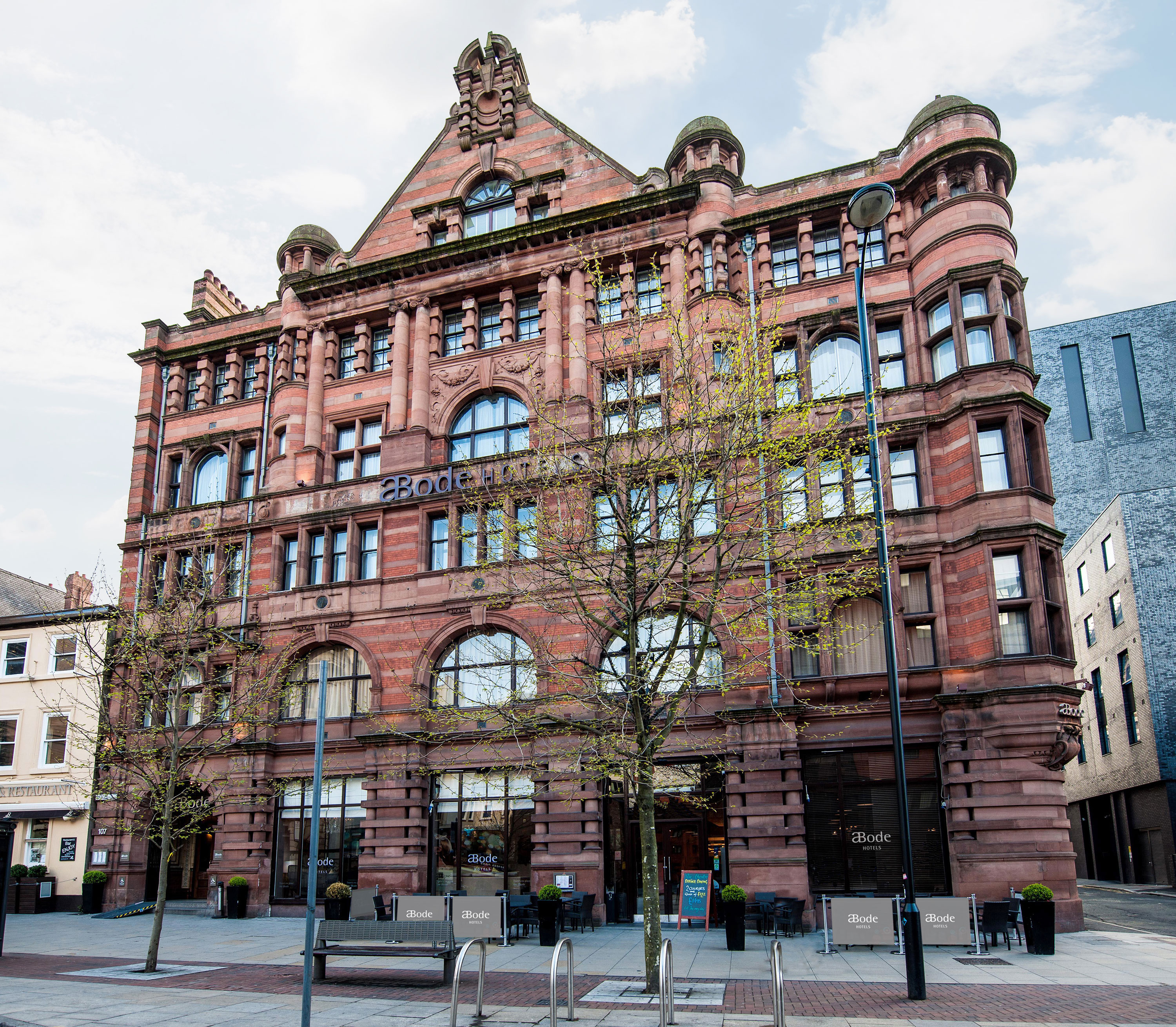 Historic ABode Manchester venue with large windows, perfect for events and meetings.