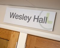 "Wesley Hall signage in The LifeCentre, ideal for conferences and events."