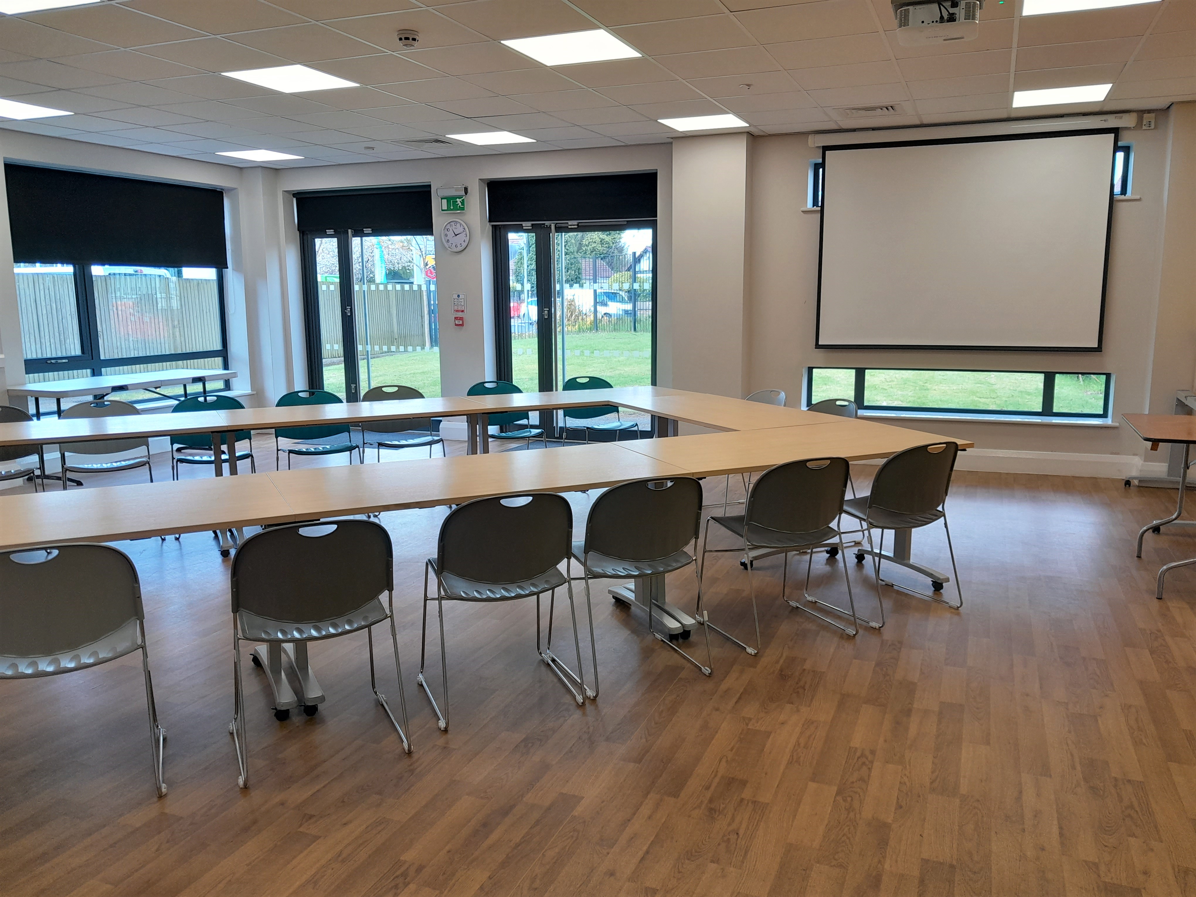 Muller Room at The LifeCentre: U-shaped table, ideal for workshops and team meetings.