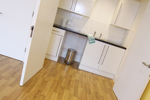 Luther King Room kitchenette, modern design for meetings and networking events.