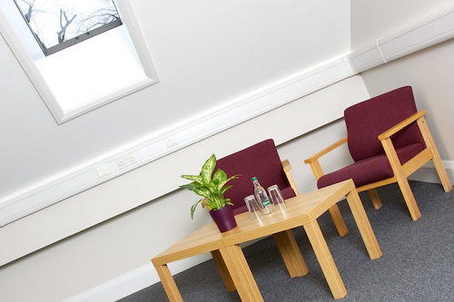 Cozy meeting space in Graham Room, ideal for brainstorming and collaboration events.