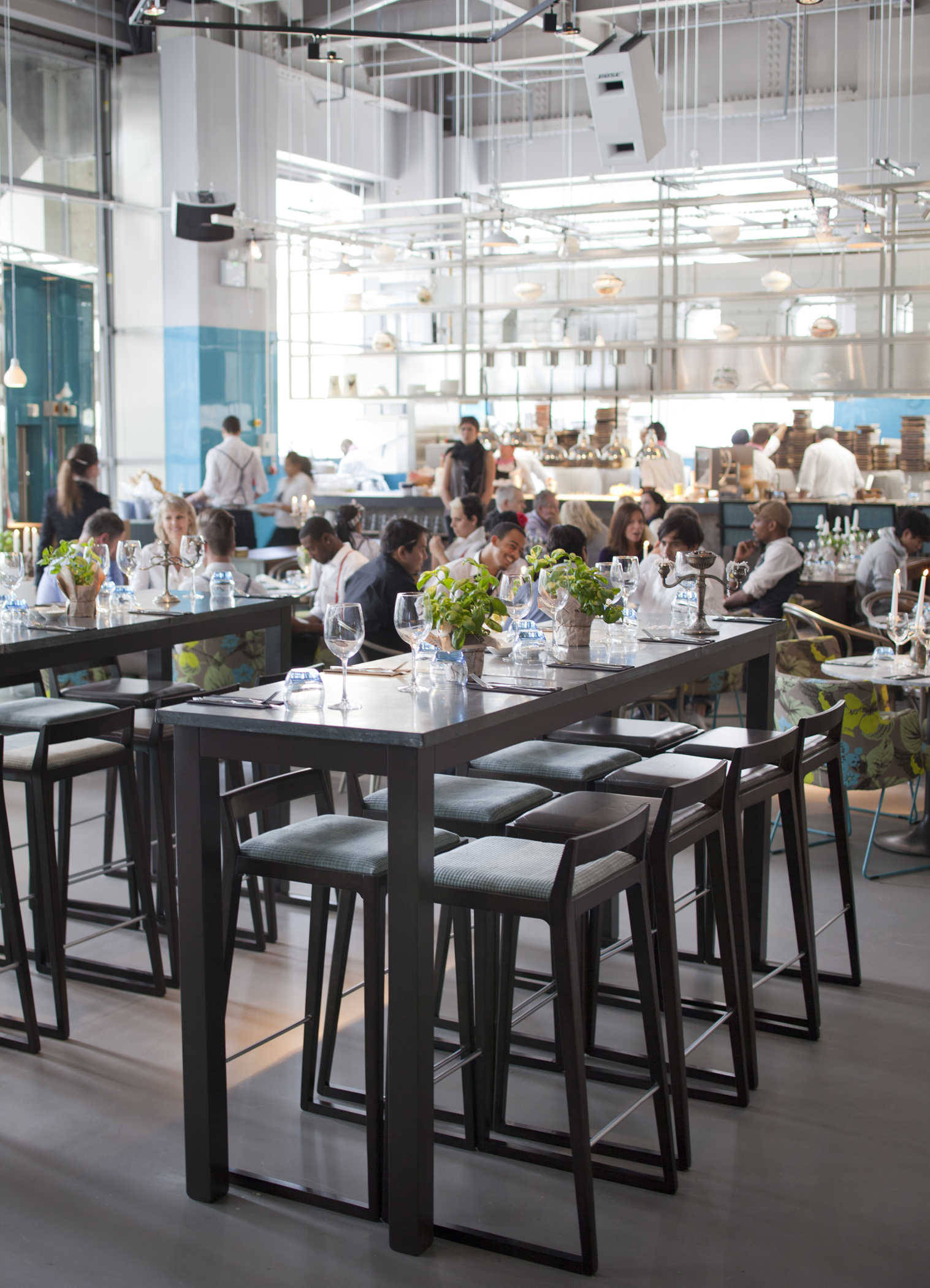 Vibrant dining space at The Drift Bar with elegant table settings for events.