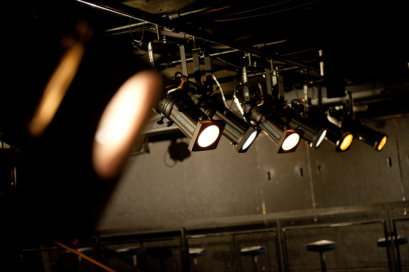 Main House Theatre stage lights enhancing ambiance for events in Soho Theatre.