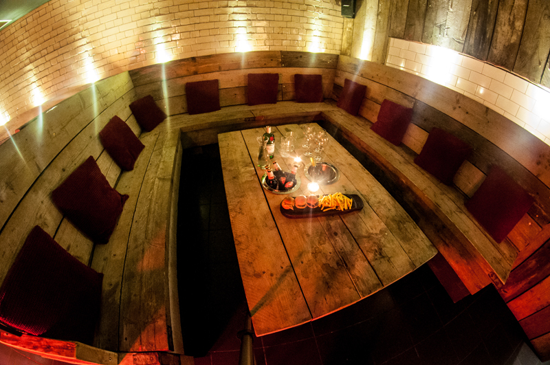 Cozy meeting space in Cord with warm lighting for intimate gatherings and brainstorming sessions.