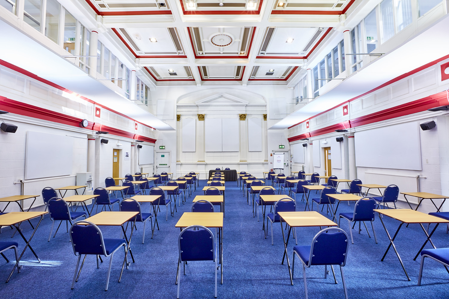 Spacious Main Hall in St Thomas Centre set for a seminar with tables and chairs.