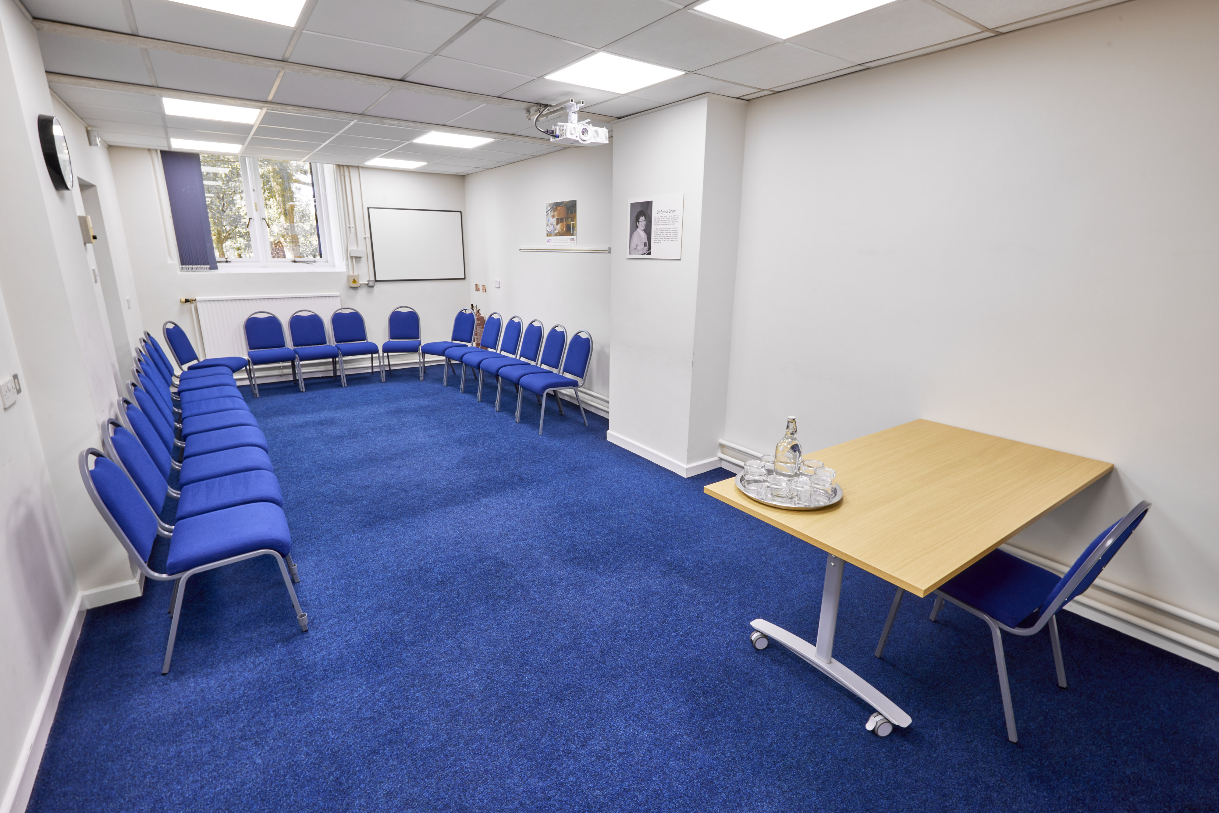 Sham Room in St Thomas Centre: circular seating for workshops and meetings, bright and inviting.