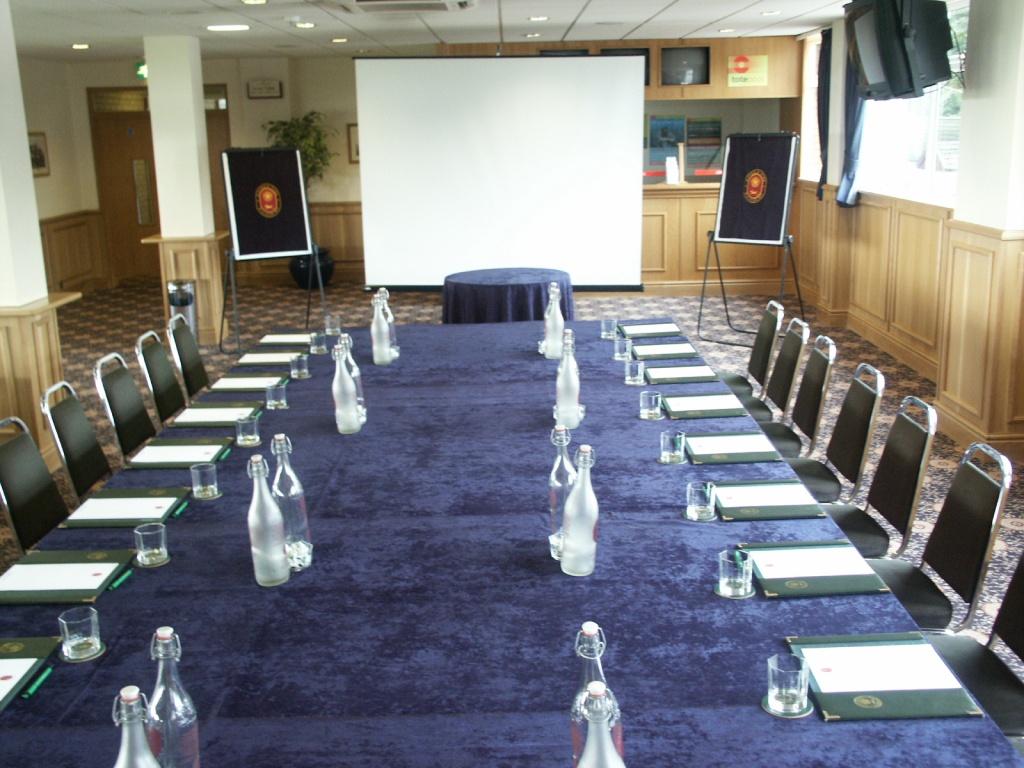 Whittle Suite meeting room at Haydock Park, elegantly set for professional events.