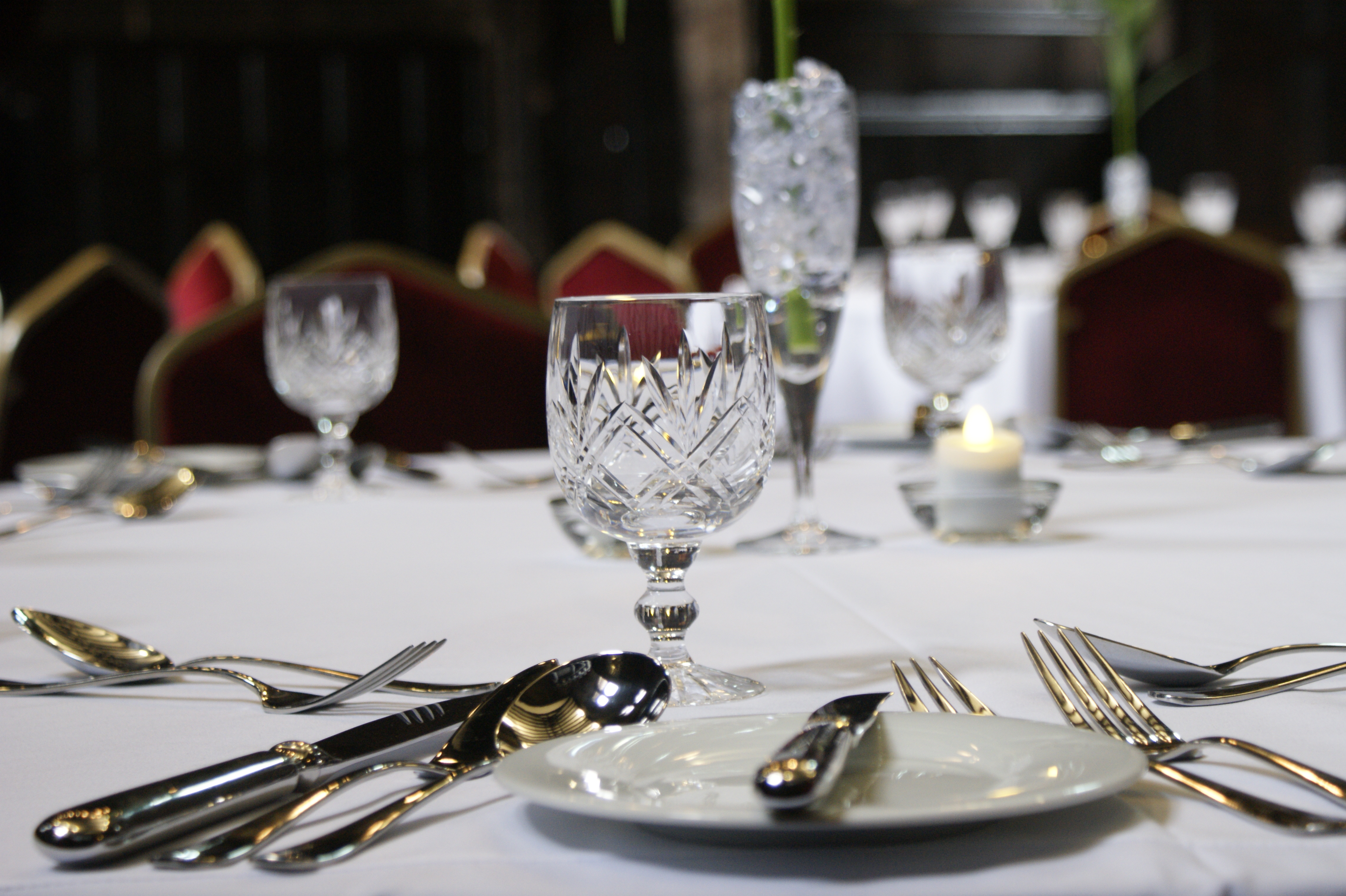 Elegant dining table in Baronial Hall, Chetham's Library for gala dinners and corporate events.