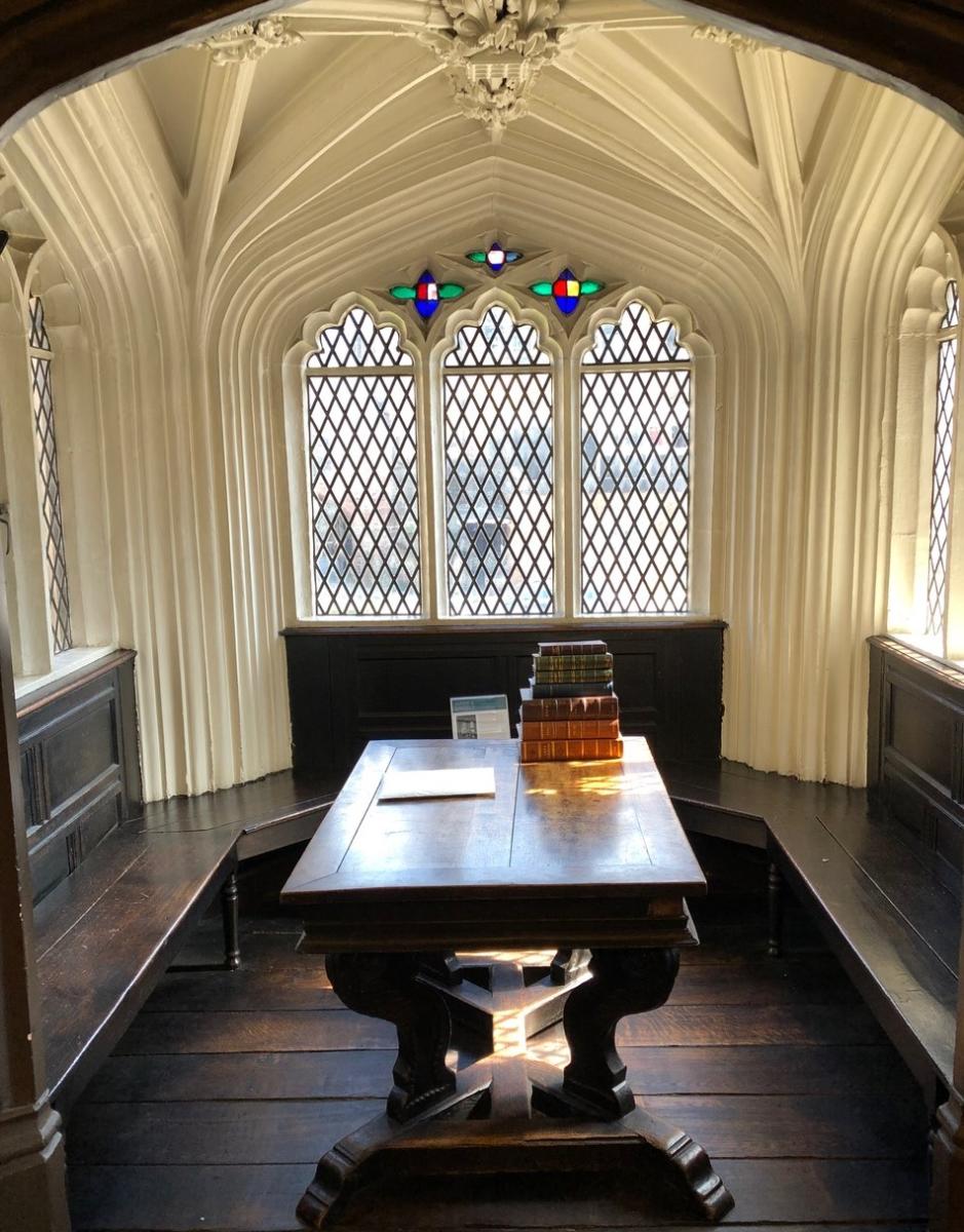 Chetham's Library Association Room with Gothic windows, perfect for meetings and workshops.