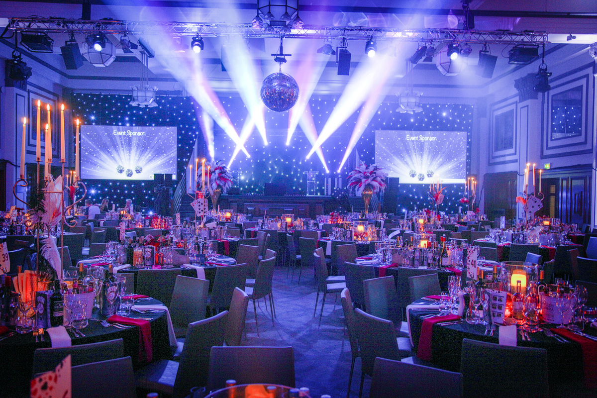 Grand Ballroom at Kimpton Clocktower Hotel, elegant setup for gala or formal dinner.