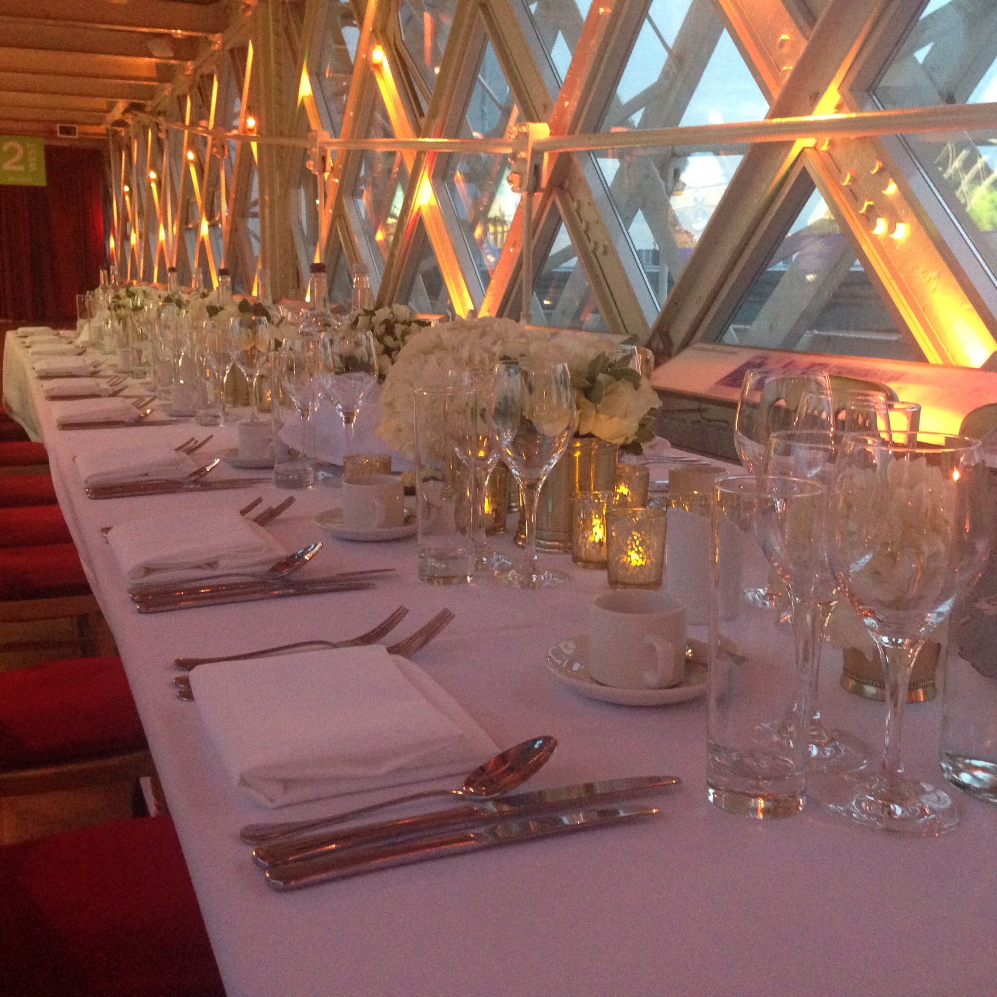 Elegant dining table setup at Tower Bridge for gala dinner or corporate event.