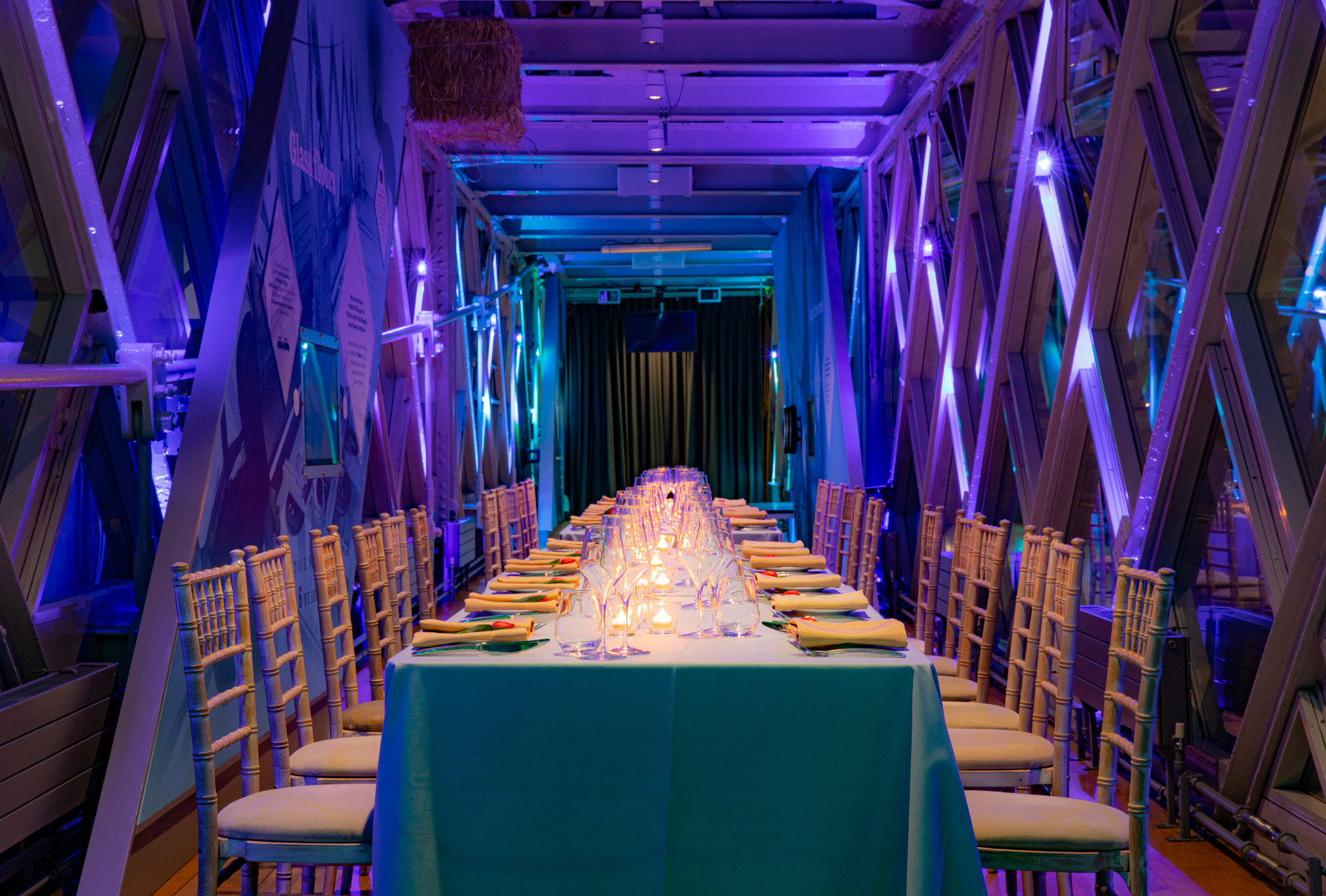 Elegant banquet table at Tower Bridge, illuminated for upscale events and corporate dinners.