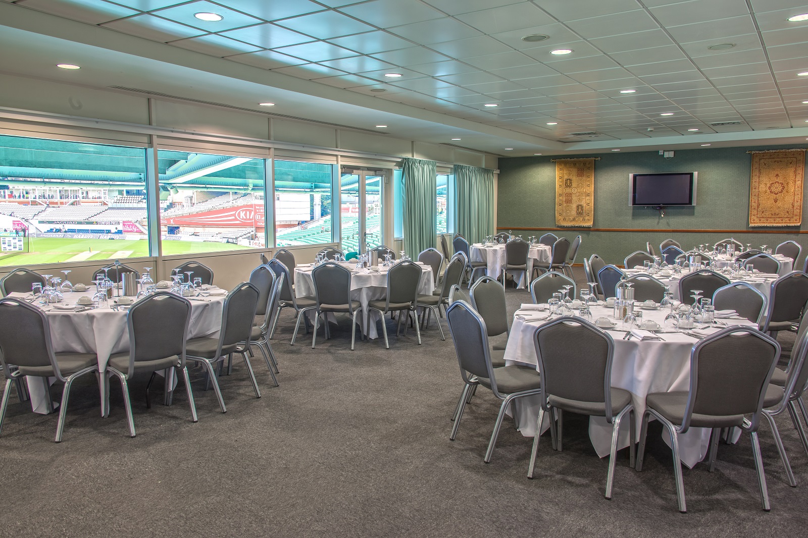 Pakistan Room at Kia Oval: elegant event space with round tables for corporate meetings.