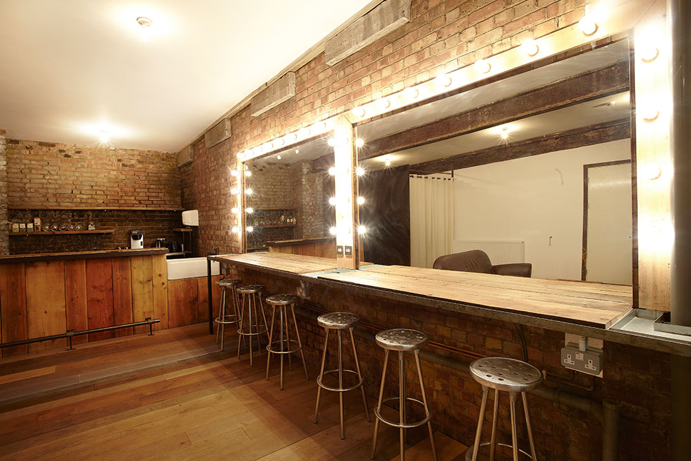 Stylish canvas venue with industrial charm, ideal for networking events and gatherings.