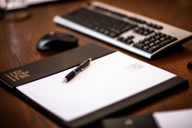 Thomas Worthington Room workspace with notepad, ideal for meetings and event planning.