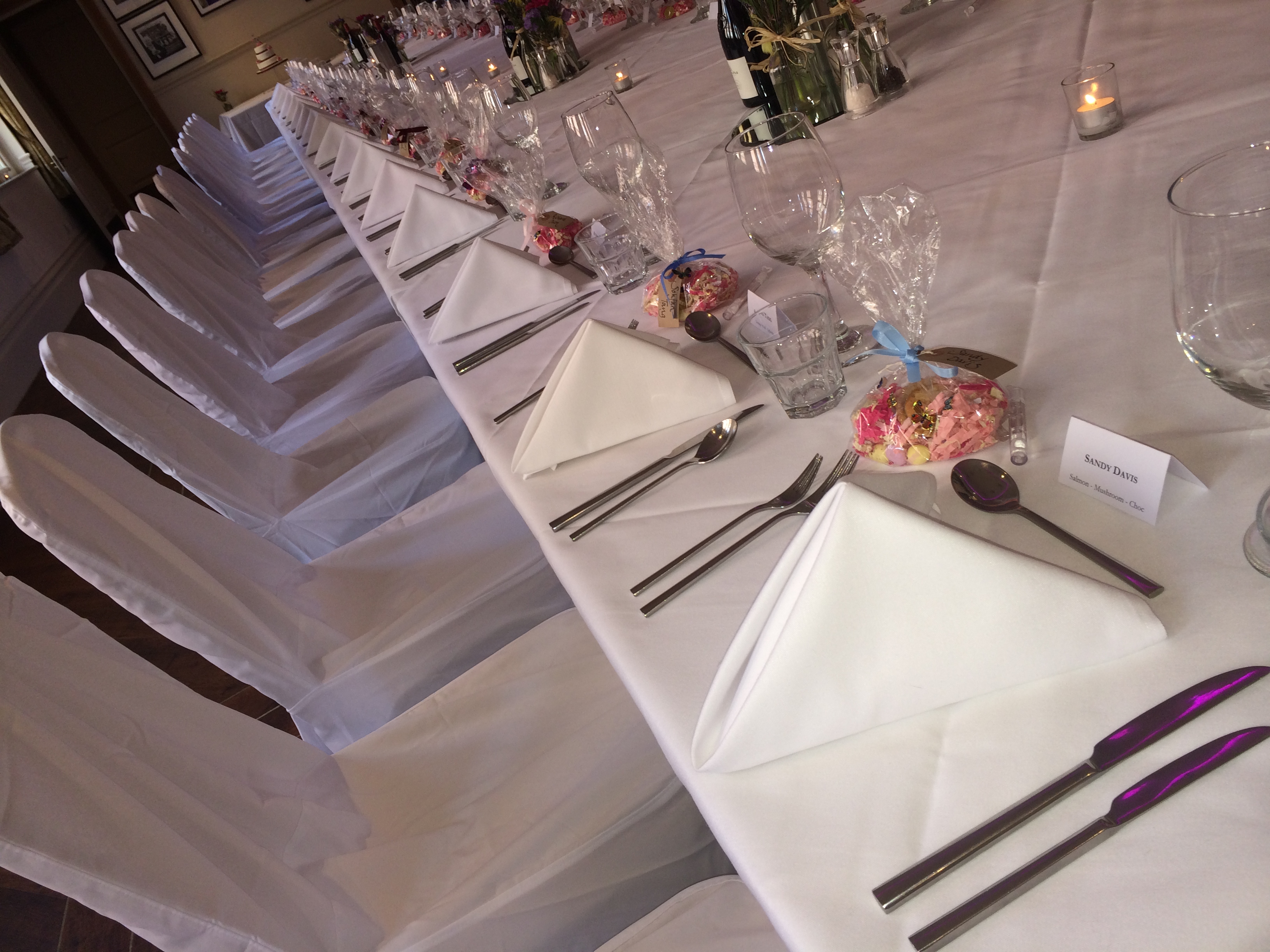 Elegant banquet table with floral centerpieces for formal events and celebrations.