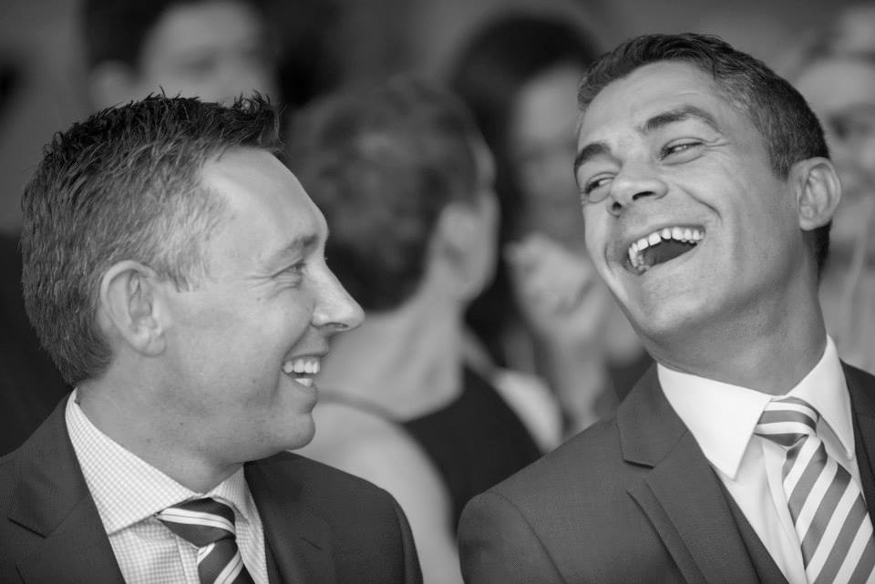 Professionals networking in The Restaurant, Fountain House, in a timeless black-and-white setting.