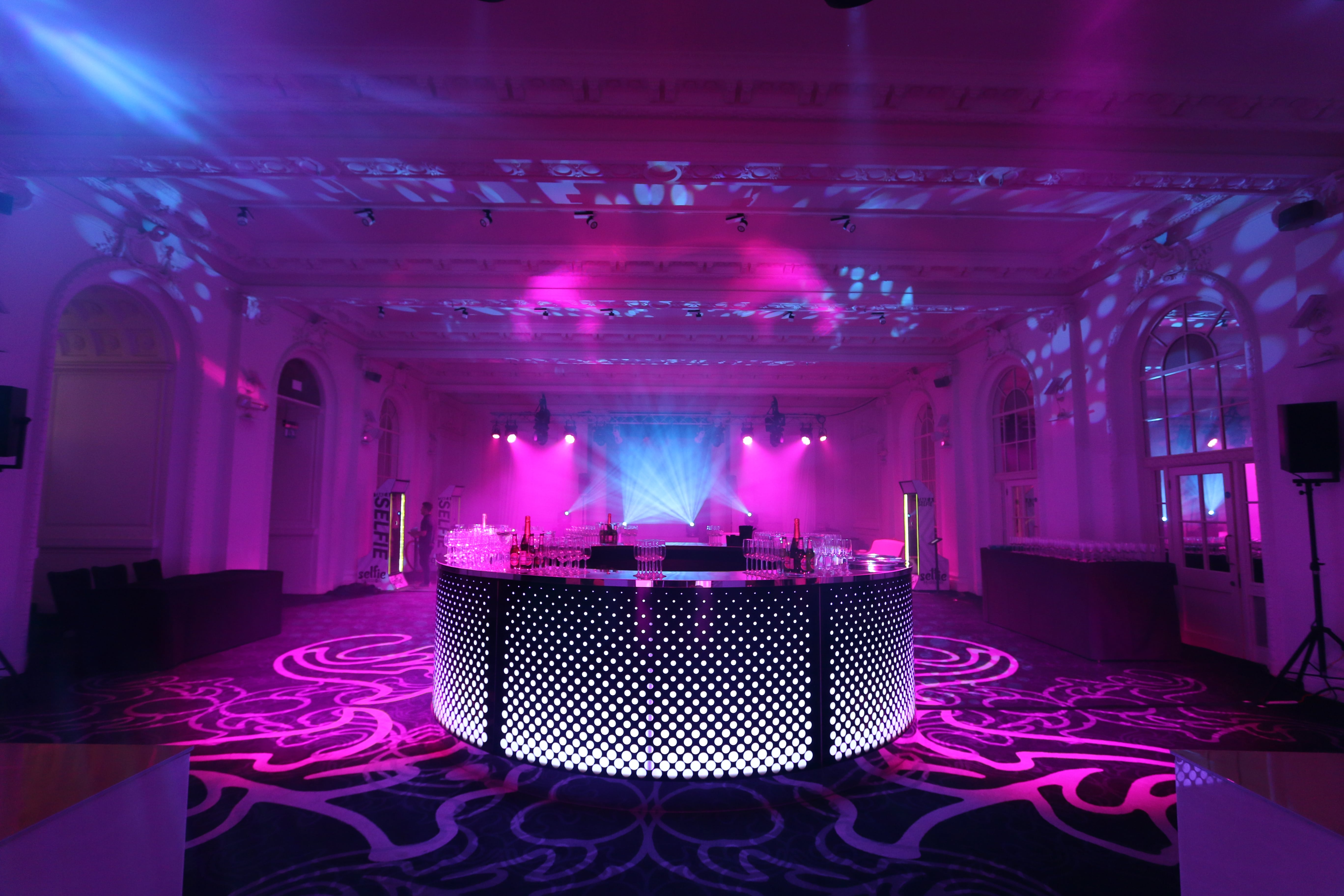 Stylish event space at 8 Northumberland Avenue with vibrant lighting for social gatherings.