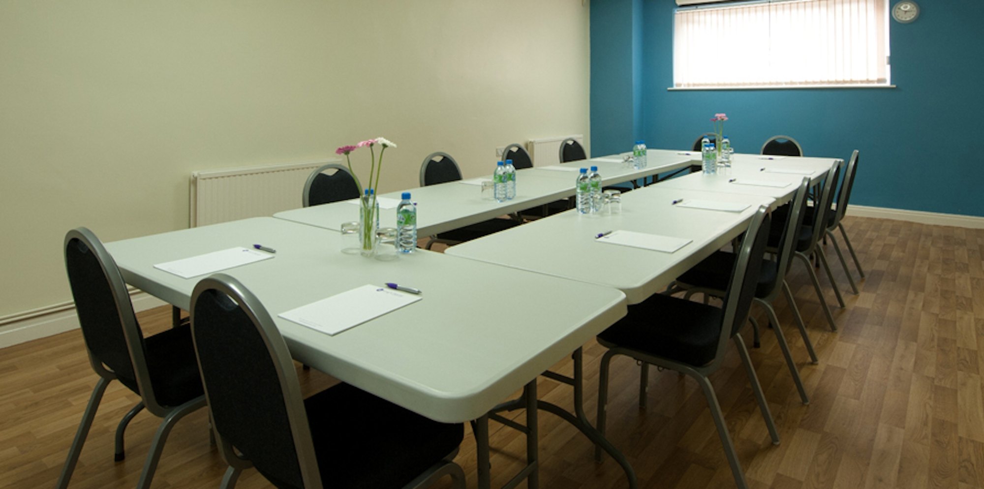 Seminar Room 5 at King's House: organized meeting space for professional gatherings.