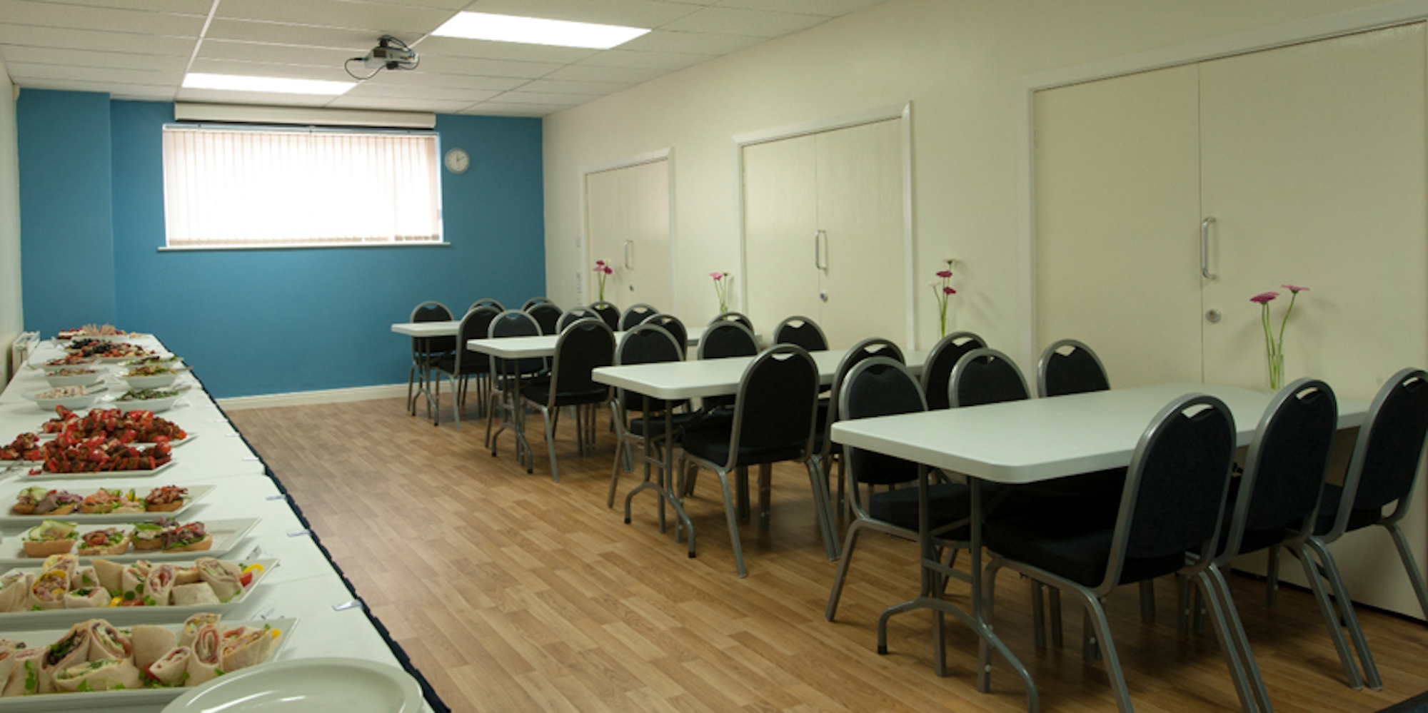Seminar Room 5 at King's House: organized meeting space for workshops and networking.