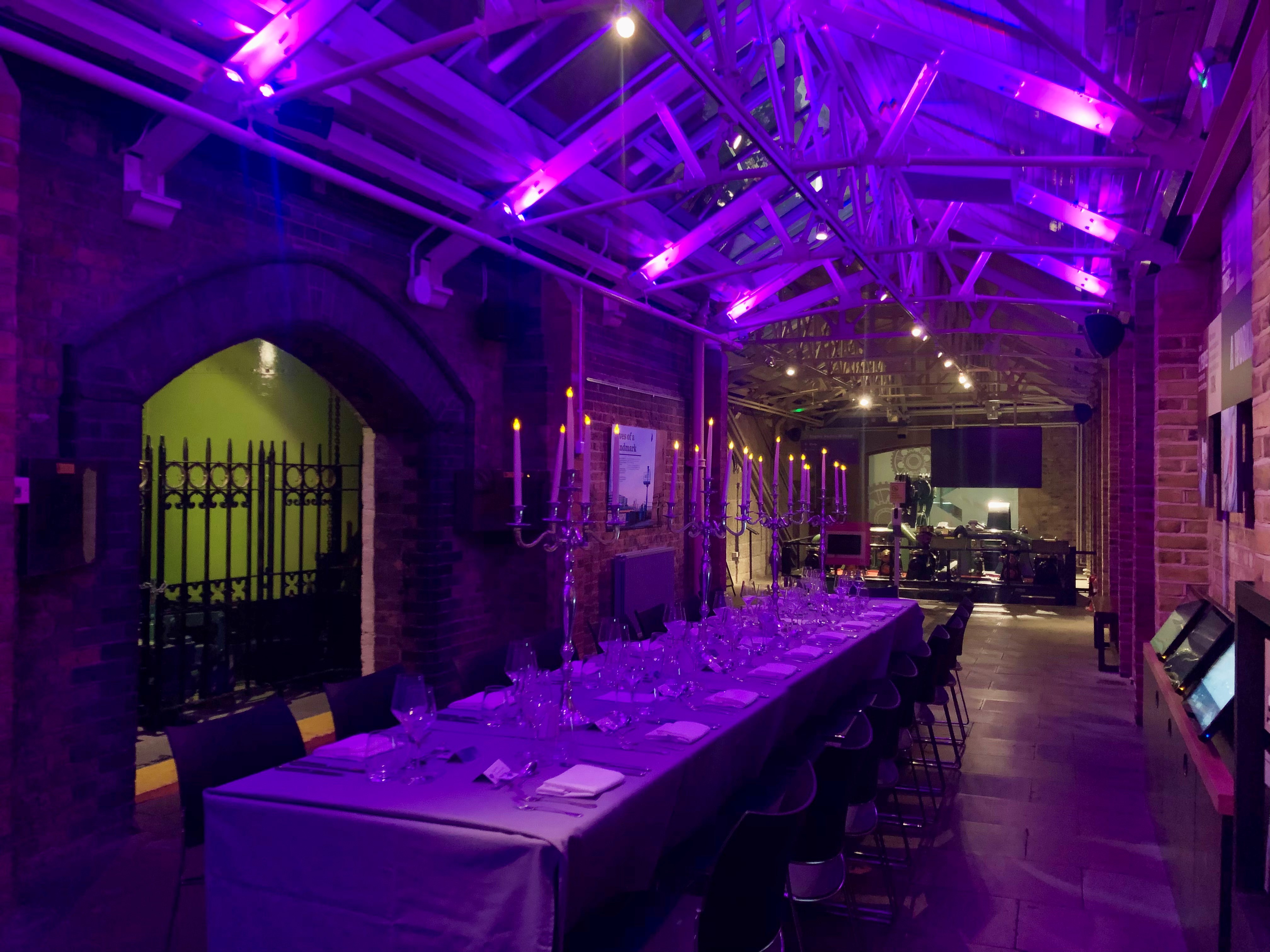 Engine Rooms Tower Bridge: elegant dining space with purple lighting for upscale events.