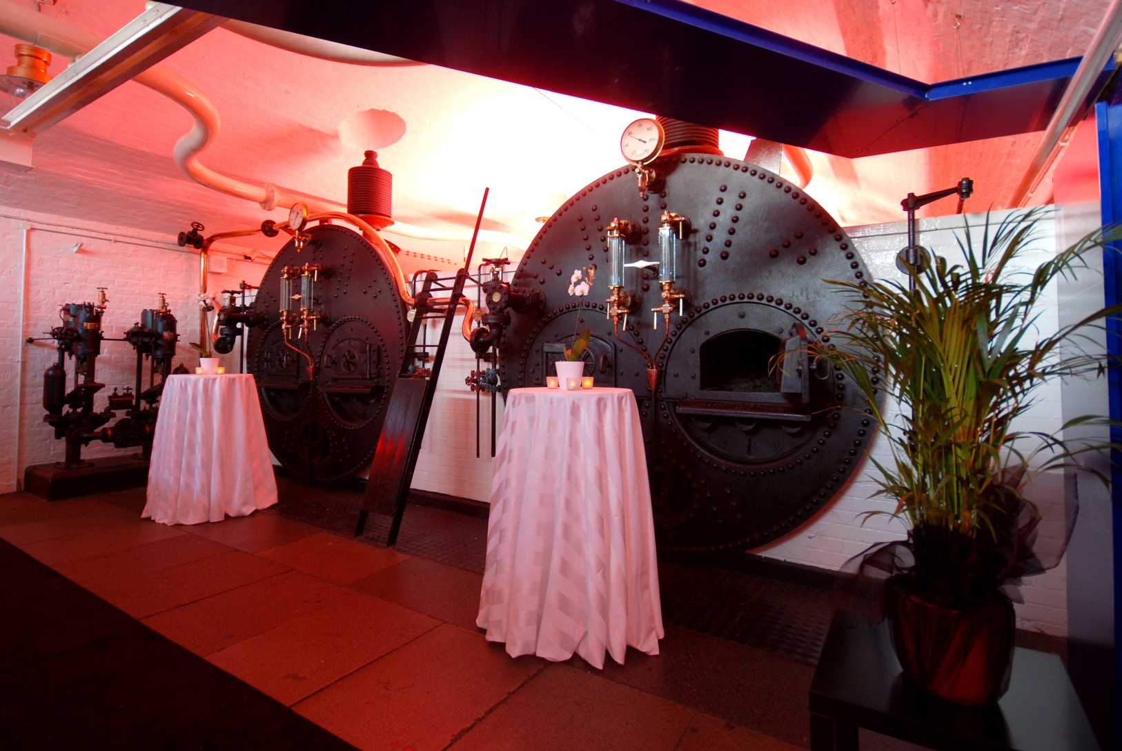 Engine Rooms at Tower Bridge: industrial venue with elegant tables for networking events.