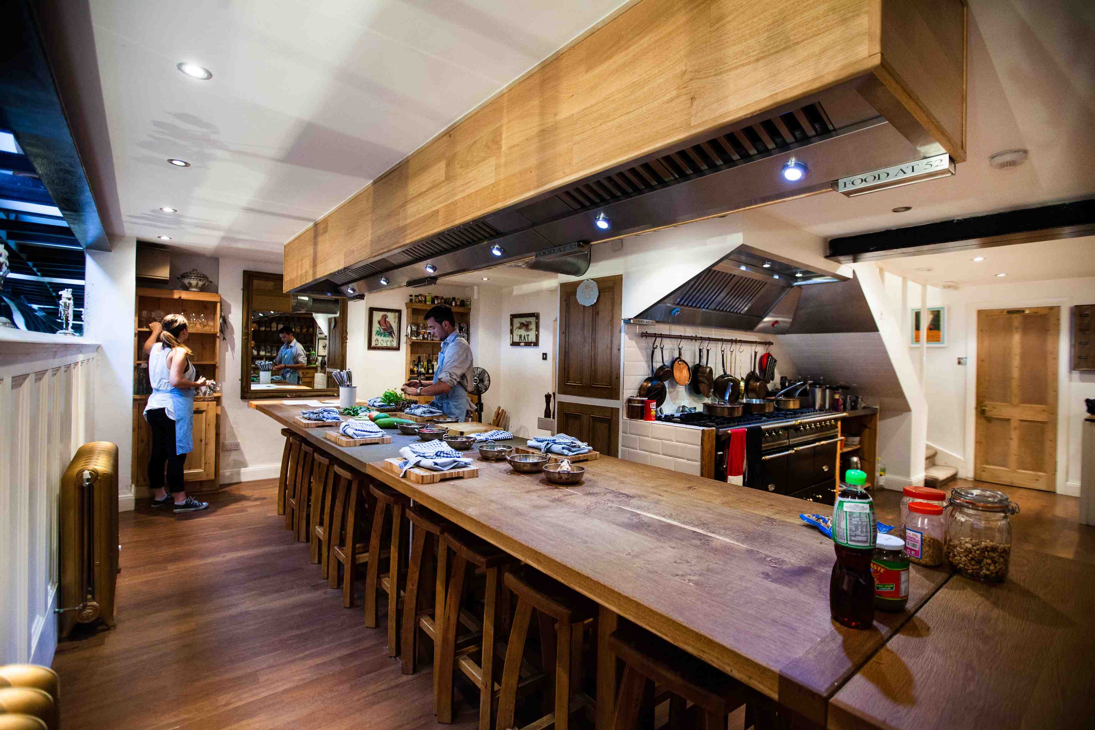 Spacious kitchen with central island for culinary events at Food at 52.