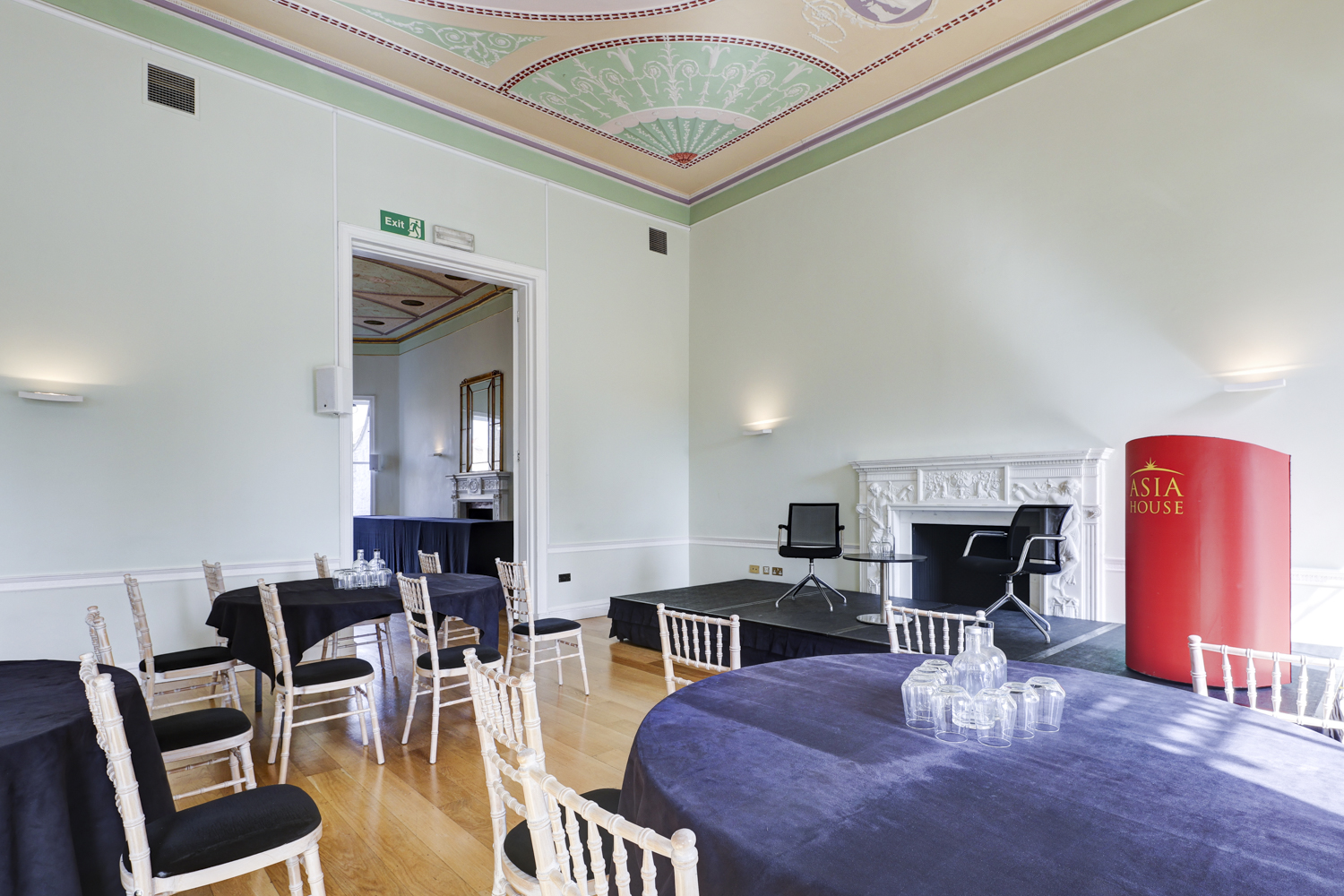 Elegant meeting room with round tables, ideal for events and presentations in Asia House.