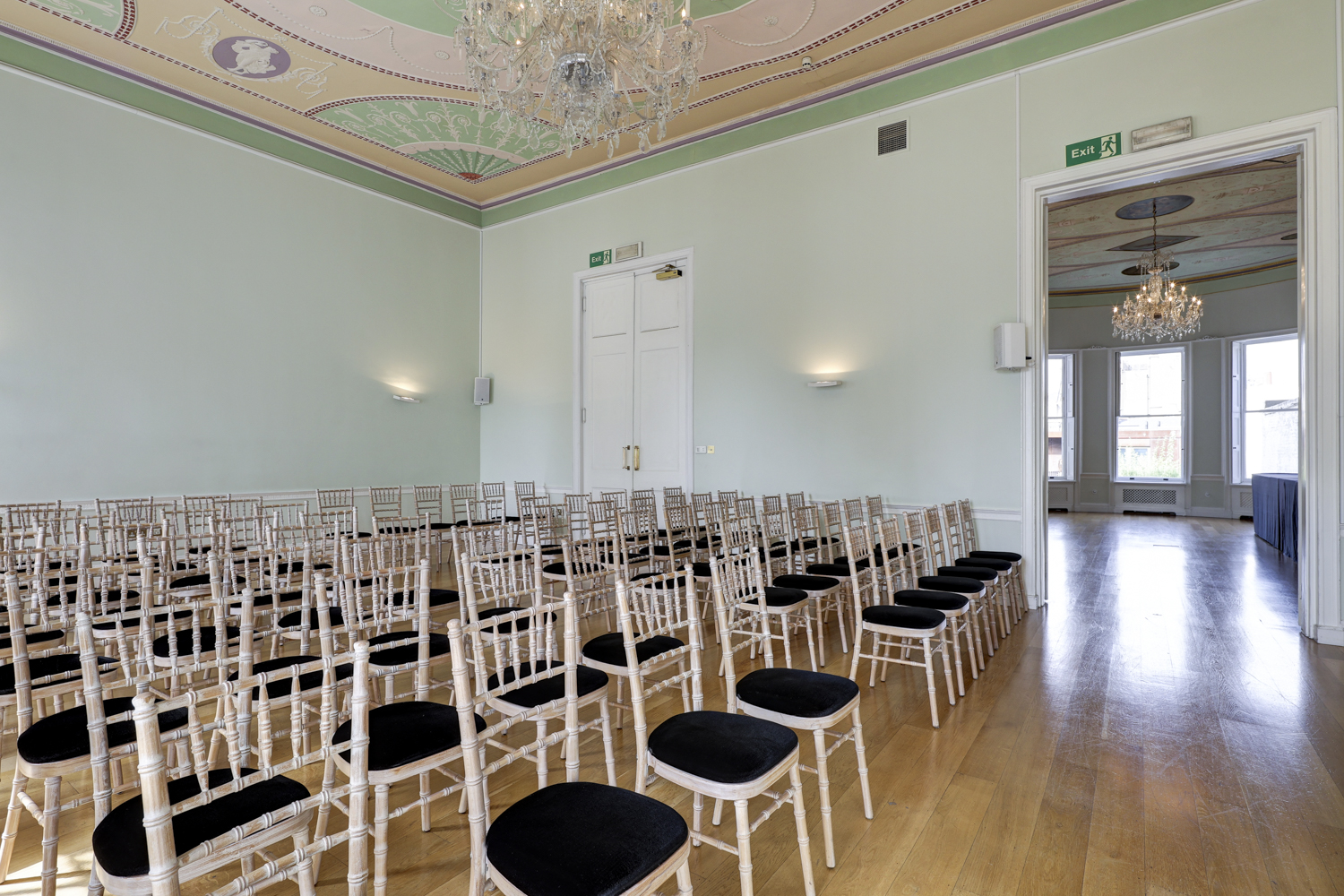 Elegant seminar room with chandeliers, ideal for events and presentations in Asia House.