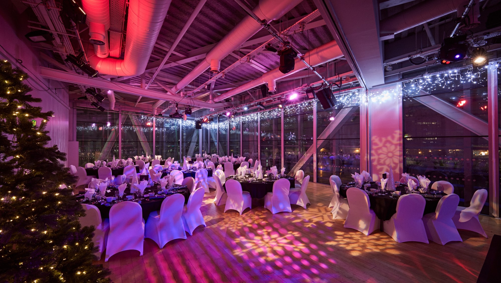 Elegant Aldridge Studio event space with black and white decor for galas and corporate dinners.
