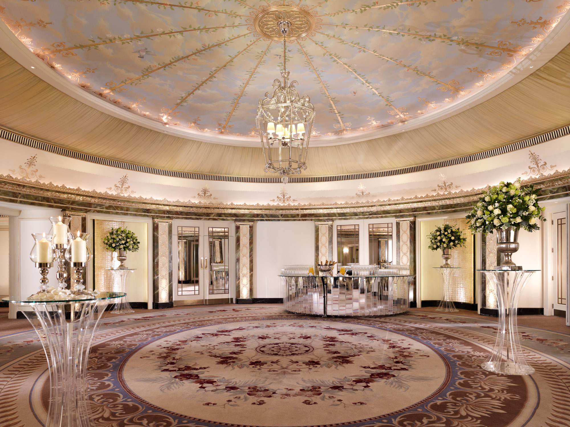 Elegant ballroom with domed ceiling, perfect for weddings and corporate events.