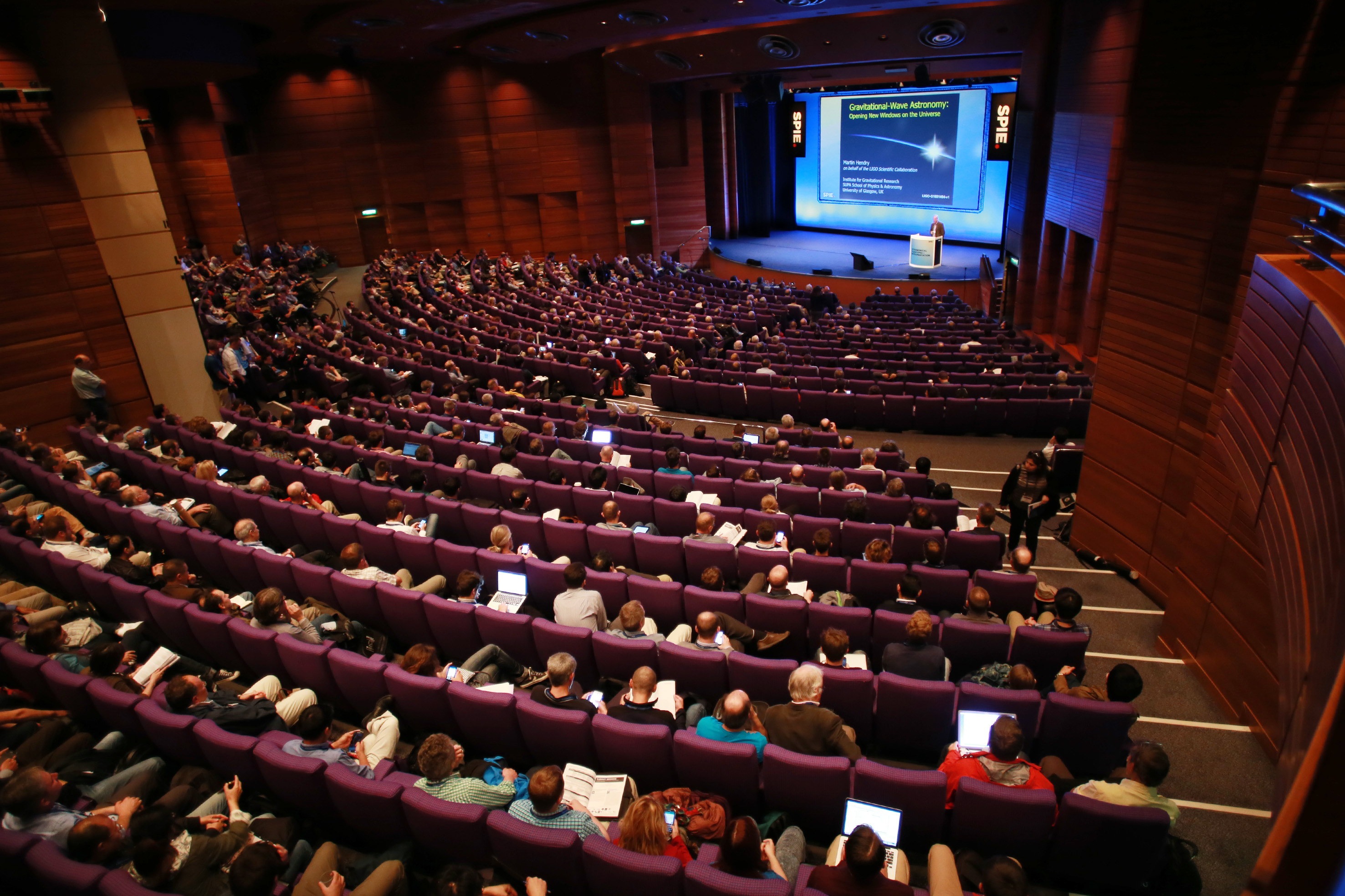 Pentland Auditorium conference with tiered seating and engaging speaker presentation.