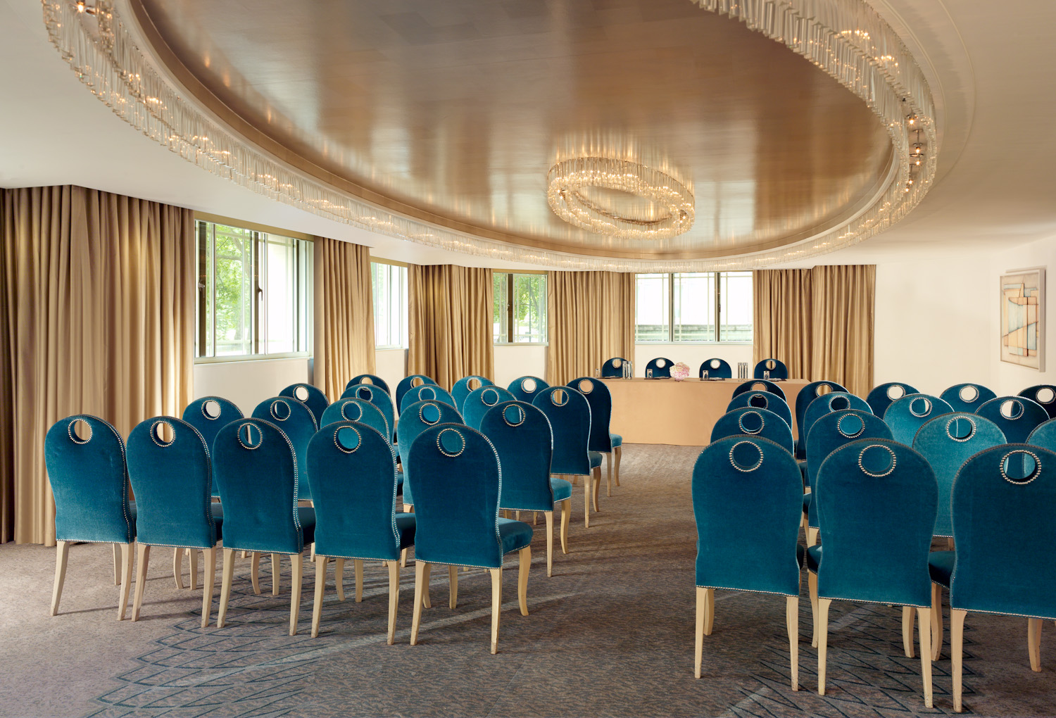 Crystal Suite at The Dorchester: elegant meeting room with blue chairs for corporate events.