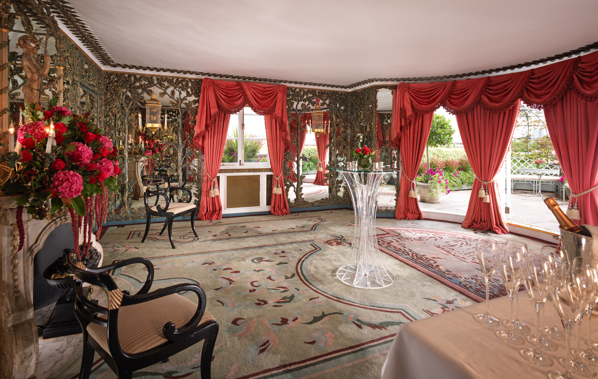 Elegant event space at The Dorchester with floral wallpaper, ideal for upscale receptions.