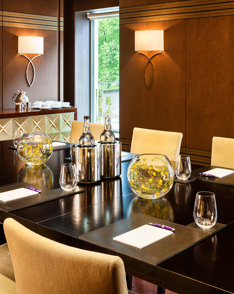 Media Room at 45 Park Lane with polished table, ideal for meetings and events.