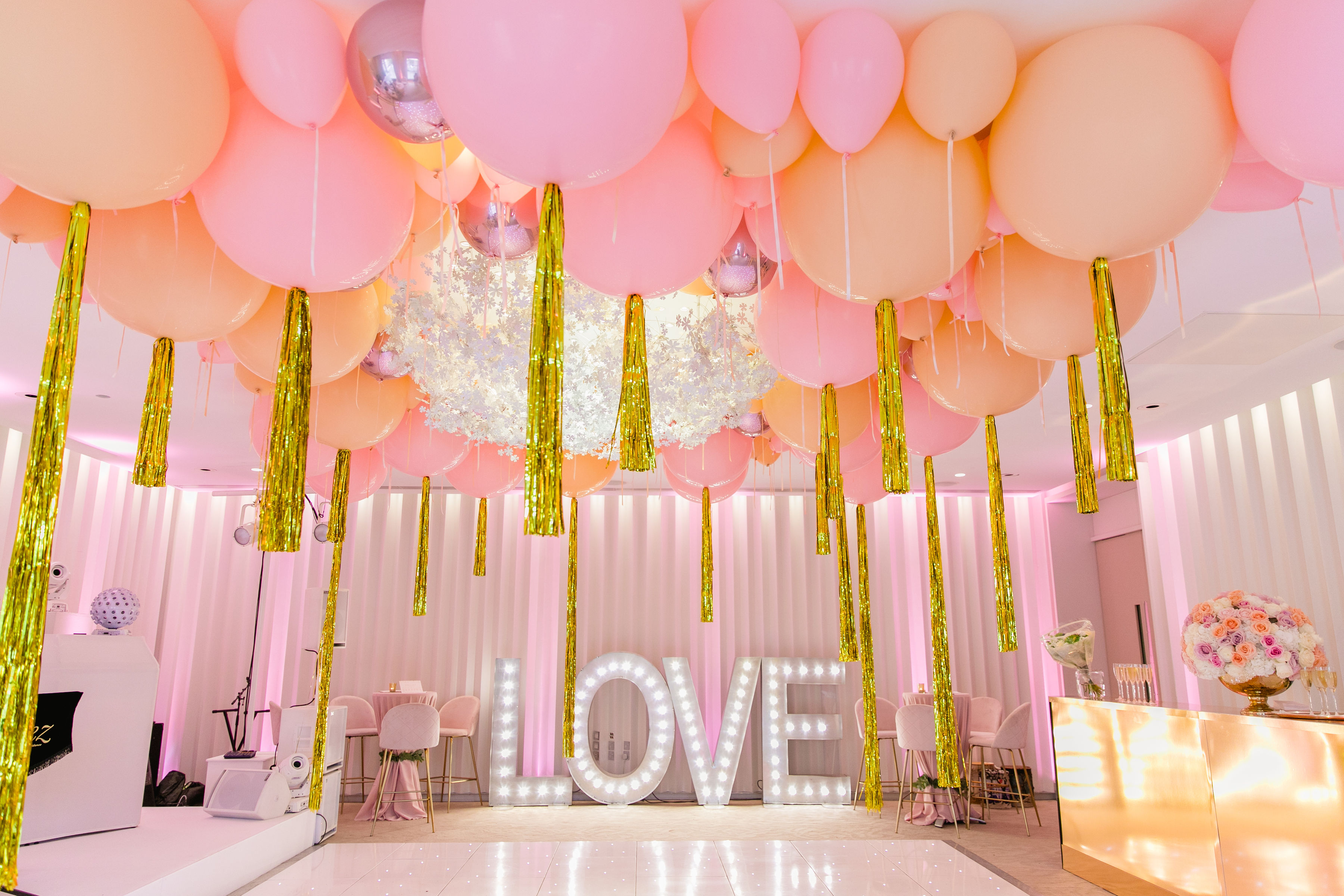 Oval Room & Garden Room at Coworth Park with pink balloon decor for weddings and events.