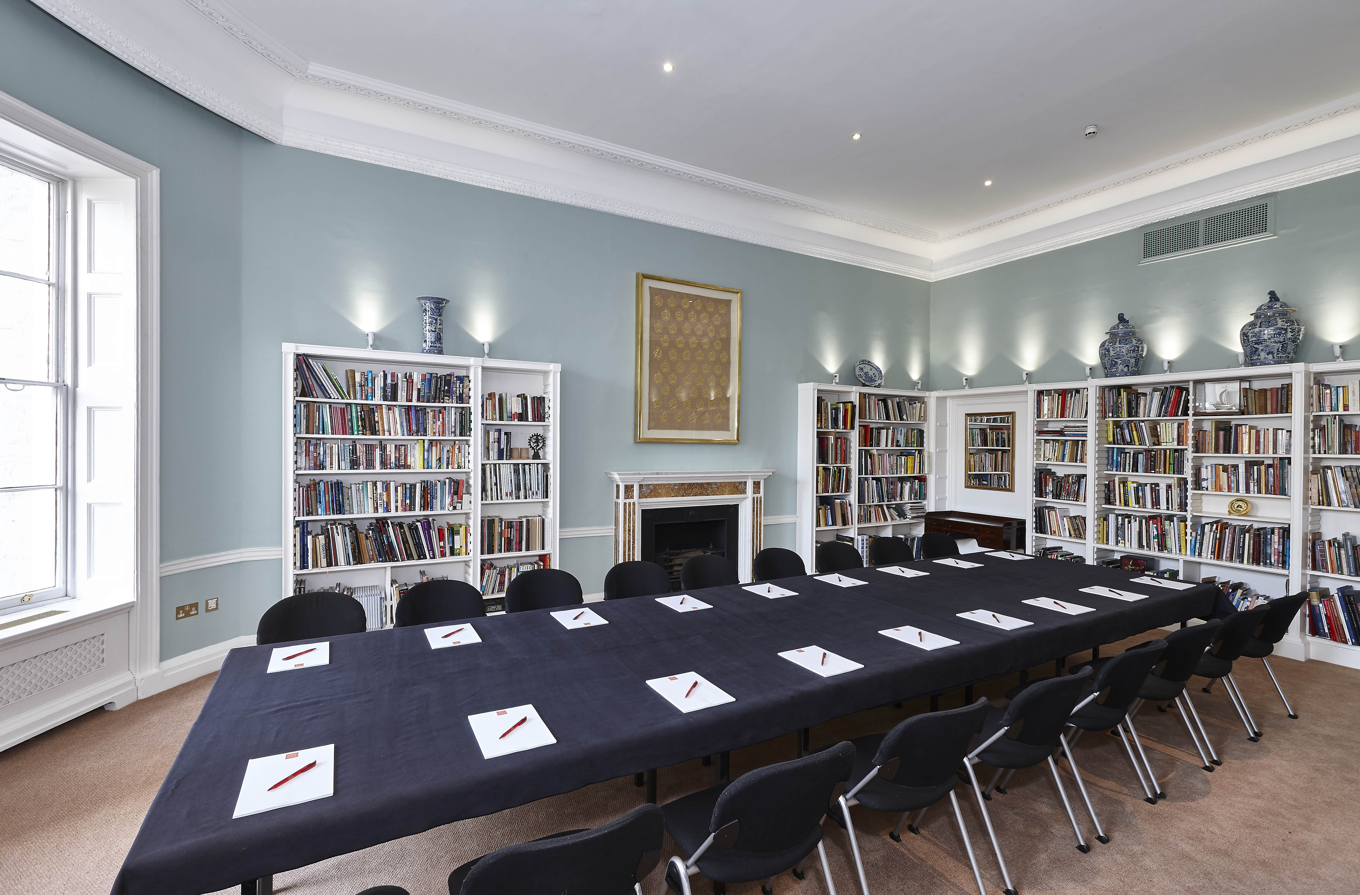 Library meeting room in Asia House, featuring a long table for professional gatherings.