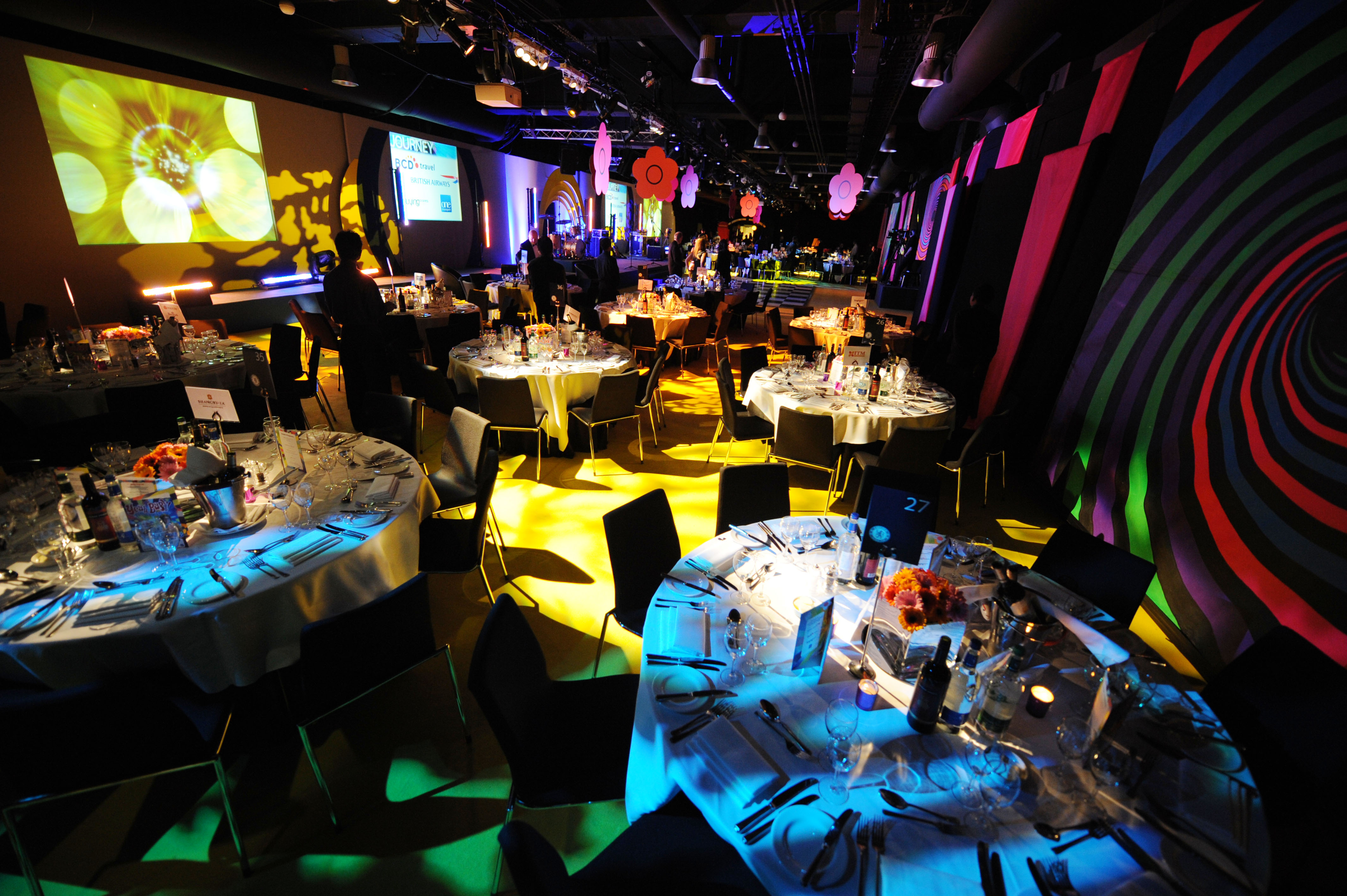 Great Hall at Chelsea FC, vibrant event space with stylish tables for networking events.