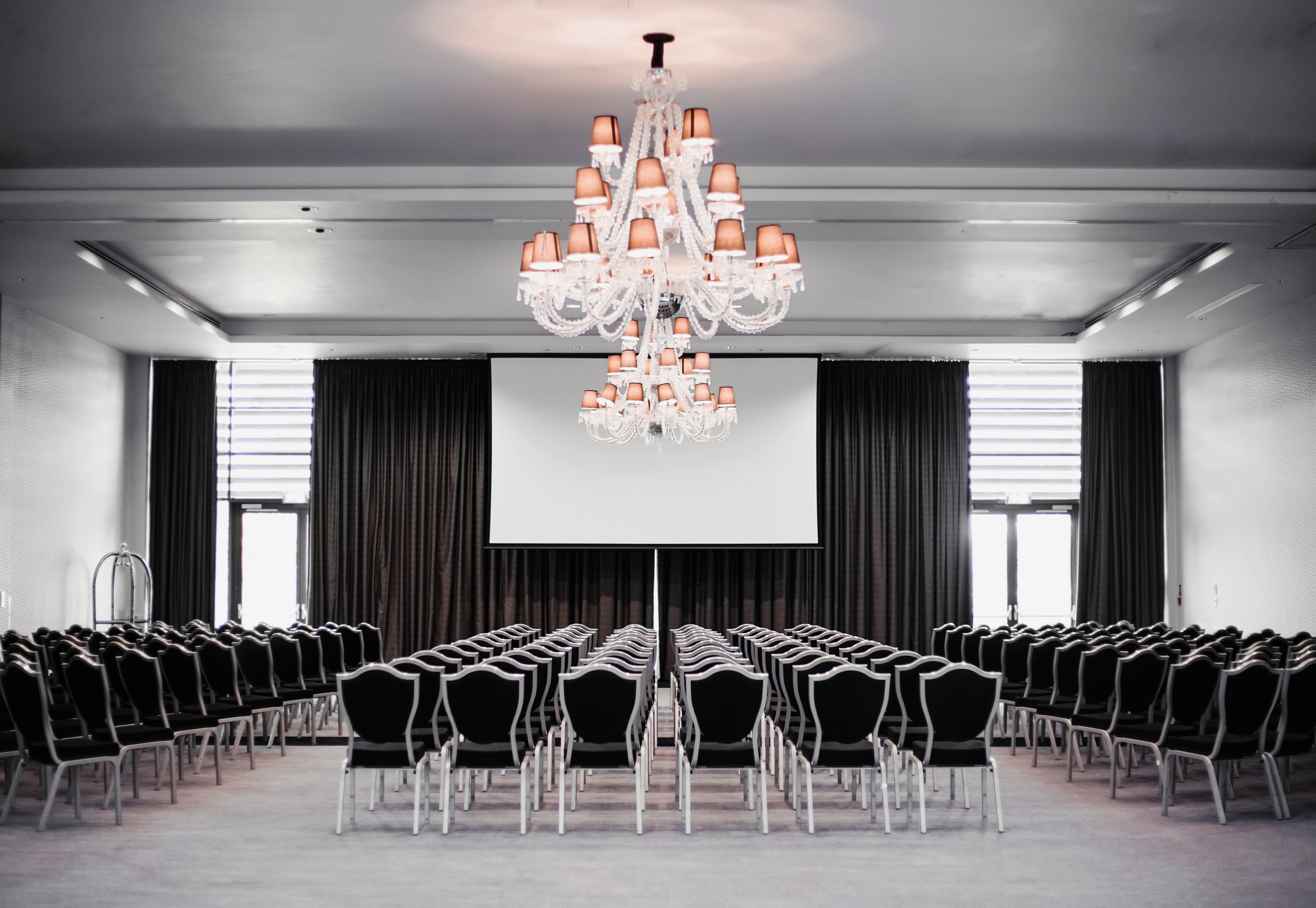Grand Syon Ballroom with chandelier, ideal for corporate meetings and seminars.