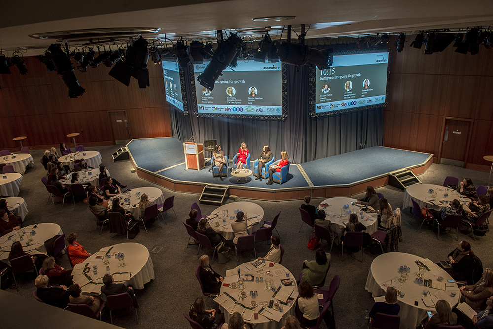 Lomond Suite conference in Edinburgh with panel discussion and engaging audience setup.